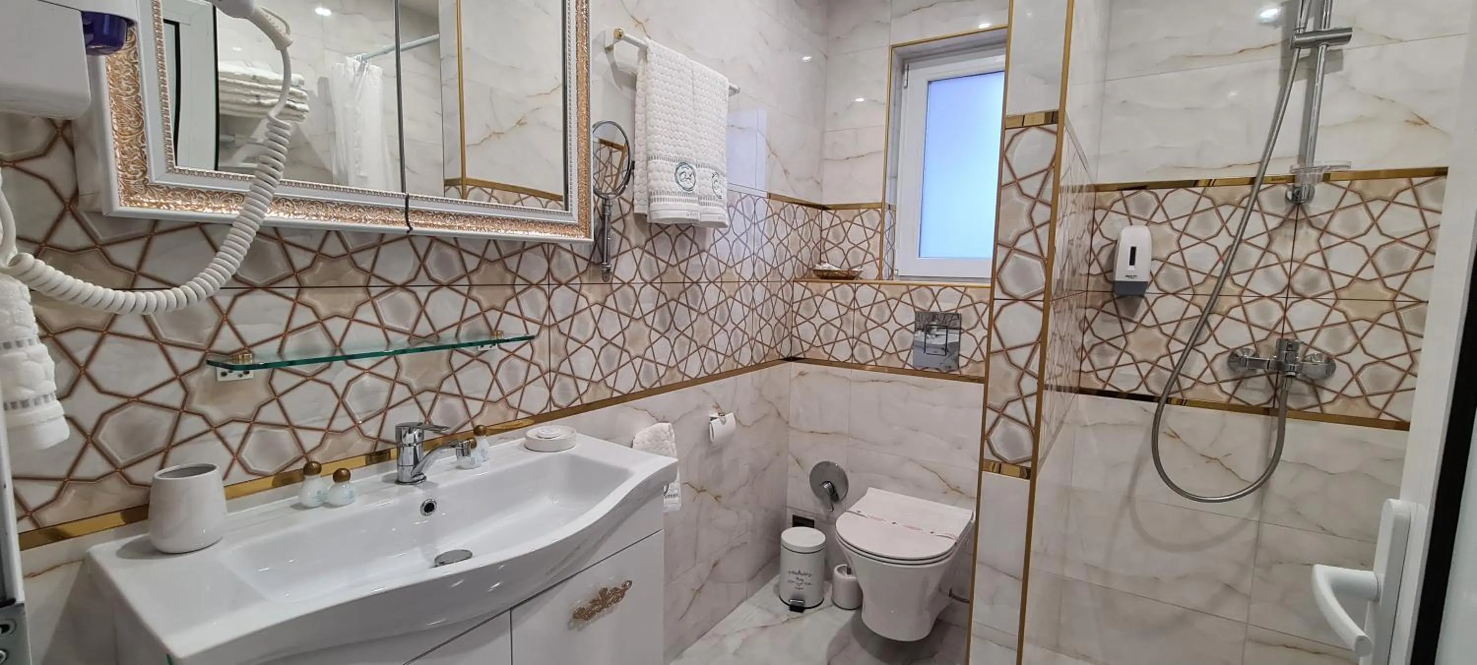 Bathroom in Aparthotel Olympus Plaza - SPA & Indoor Pool