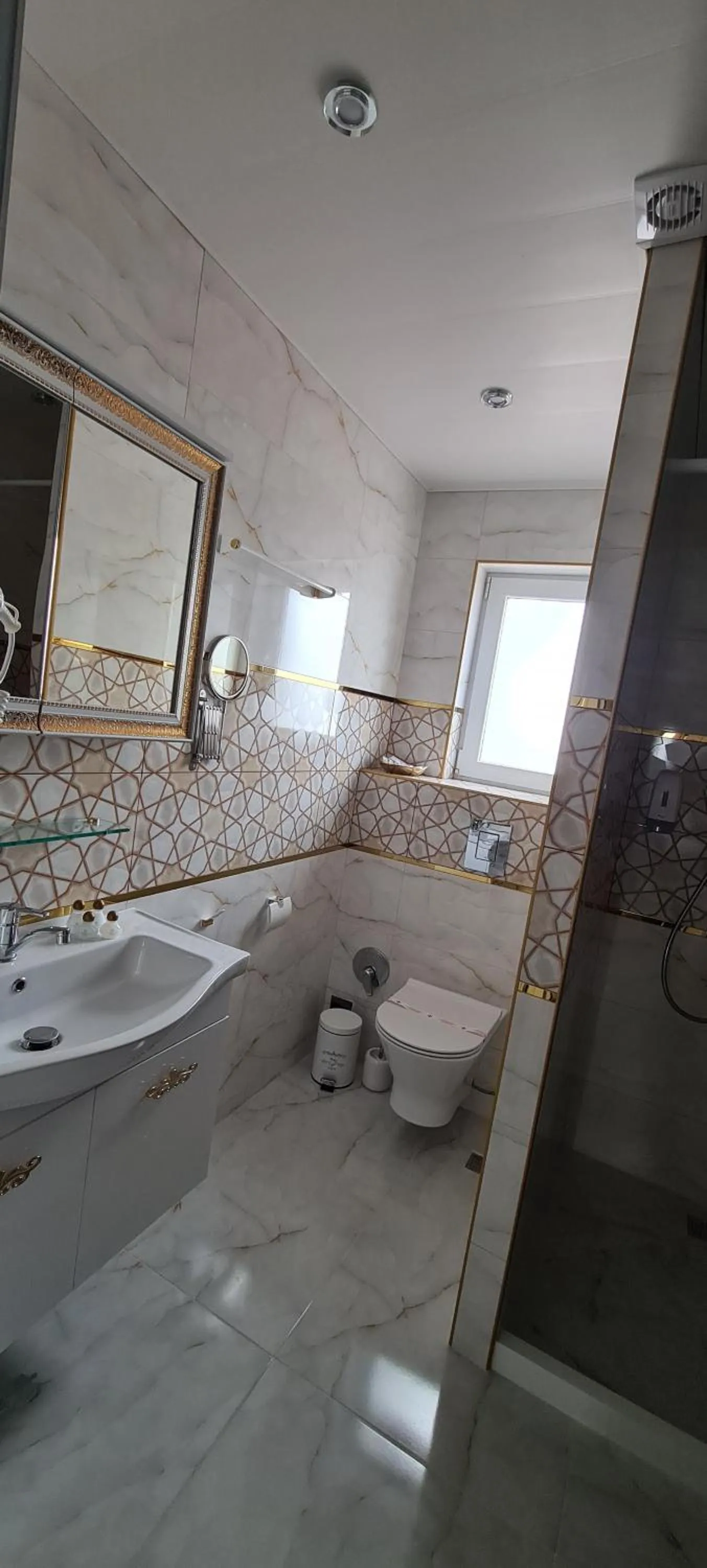 Bathroom in Aparthotel Olympus Plaza - SPA & Indoor Pool