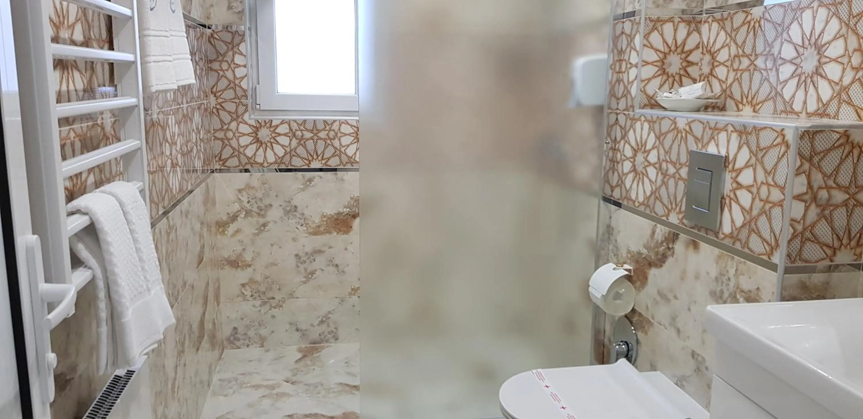 Bathroom in Aparthotel Olympus Plaza - SPA & Indoor Pool