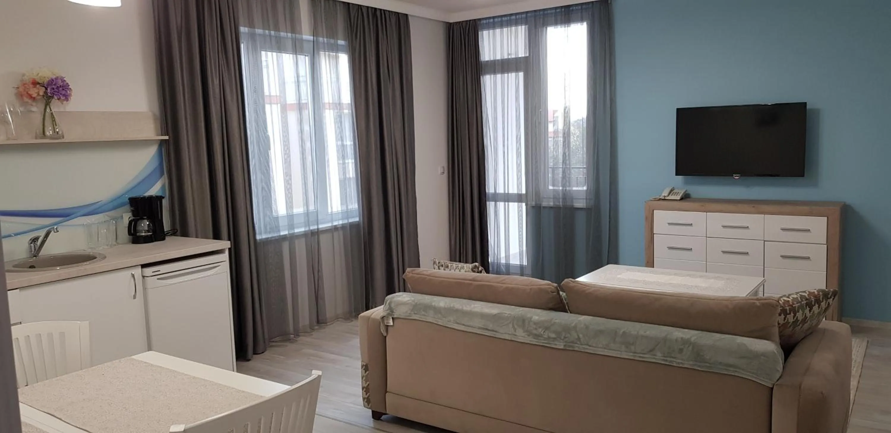 Communal lounge/ TV room, Bed in Aparthotel Olympus Plaza - SPA & Indoor Pool