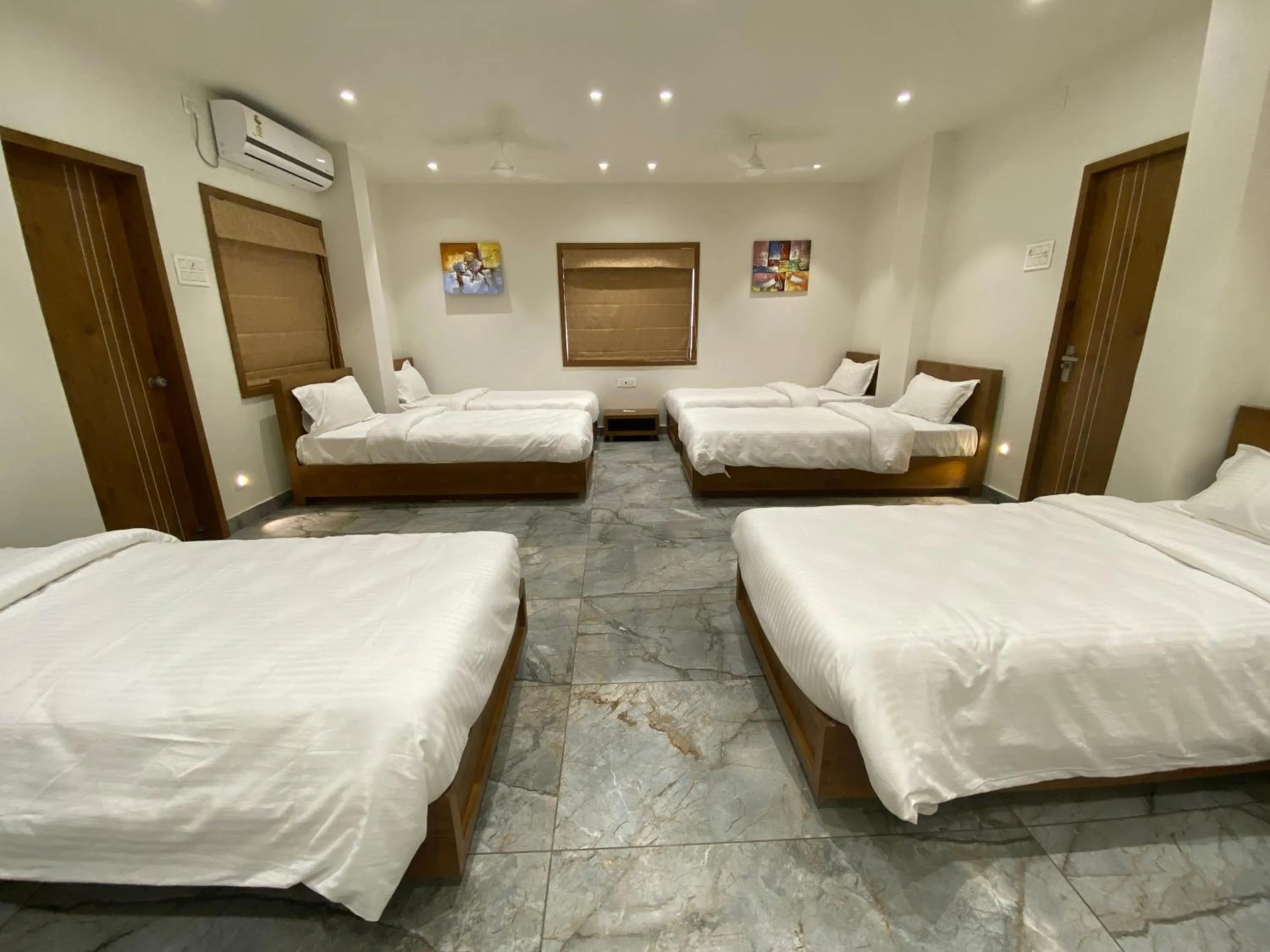 Bed in HOTEL DAMODAR