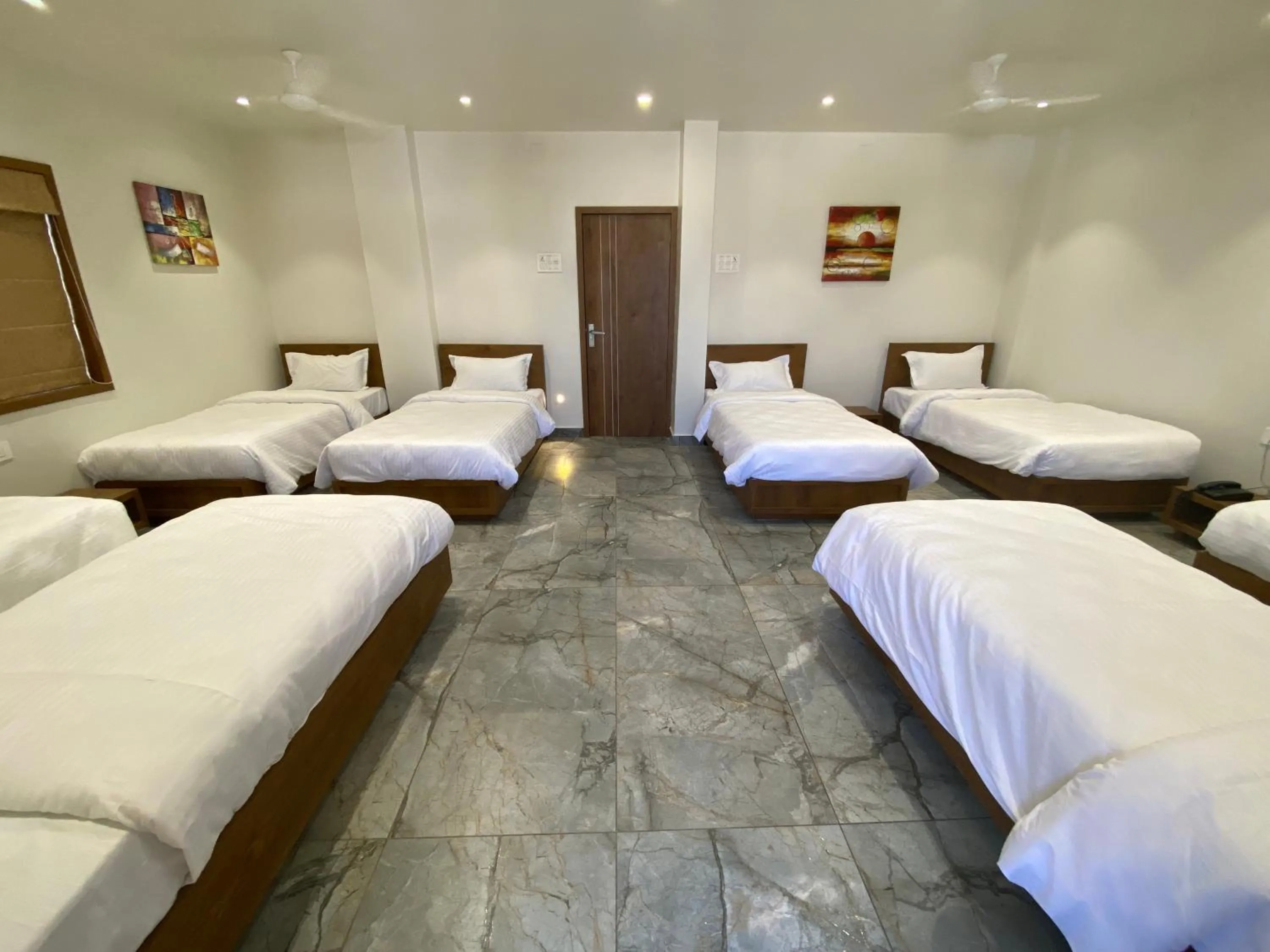 Bed in HOTEL DAMODAR