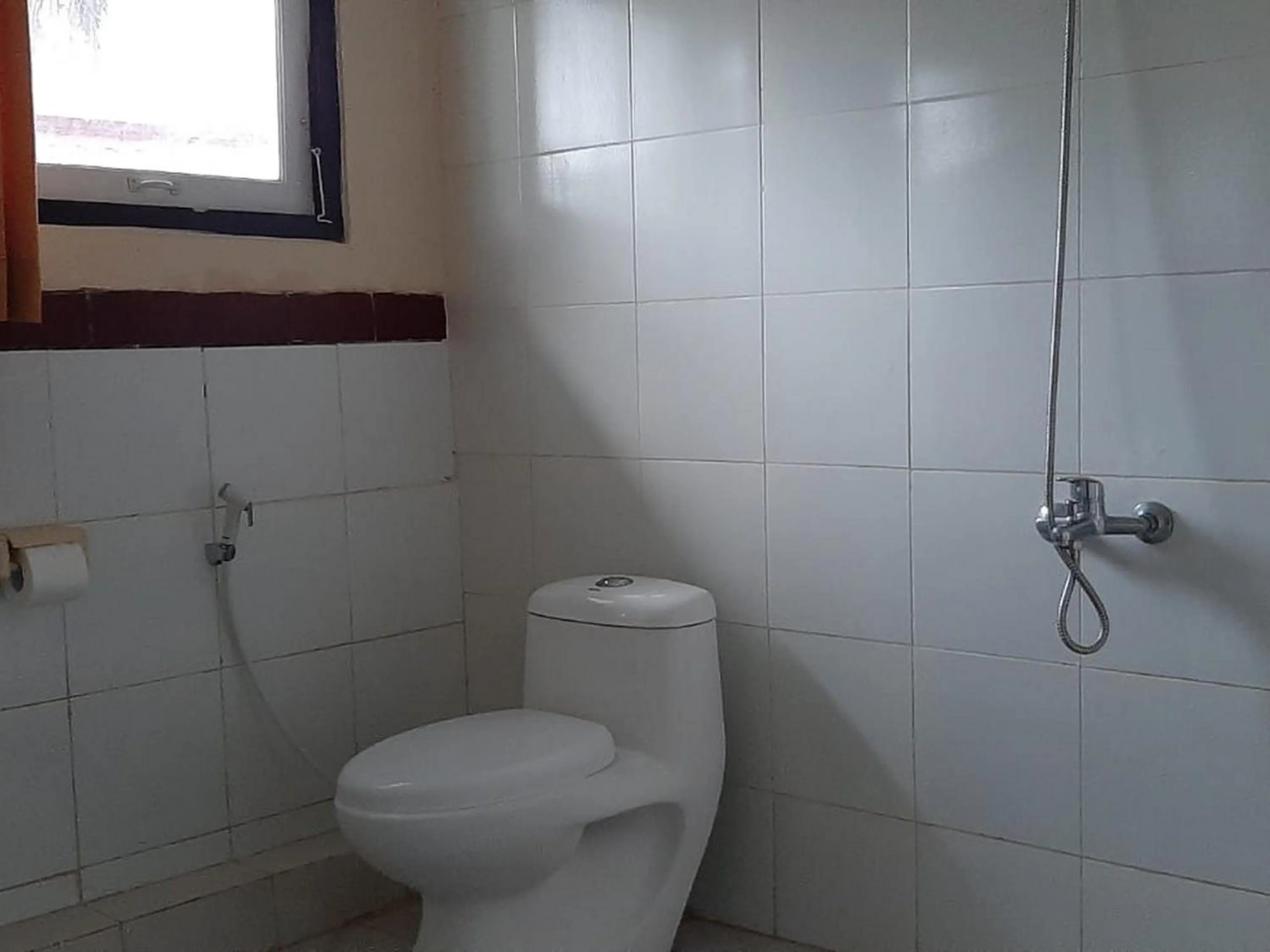 Bathroom in RedDoorz At Hotel Pakem Sari Kaliurang