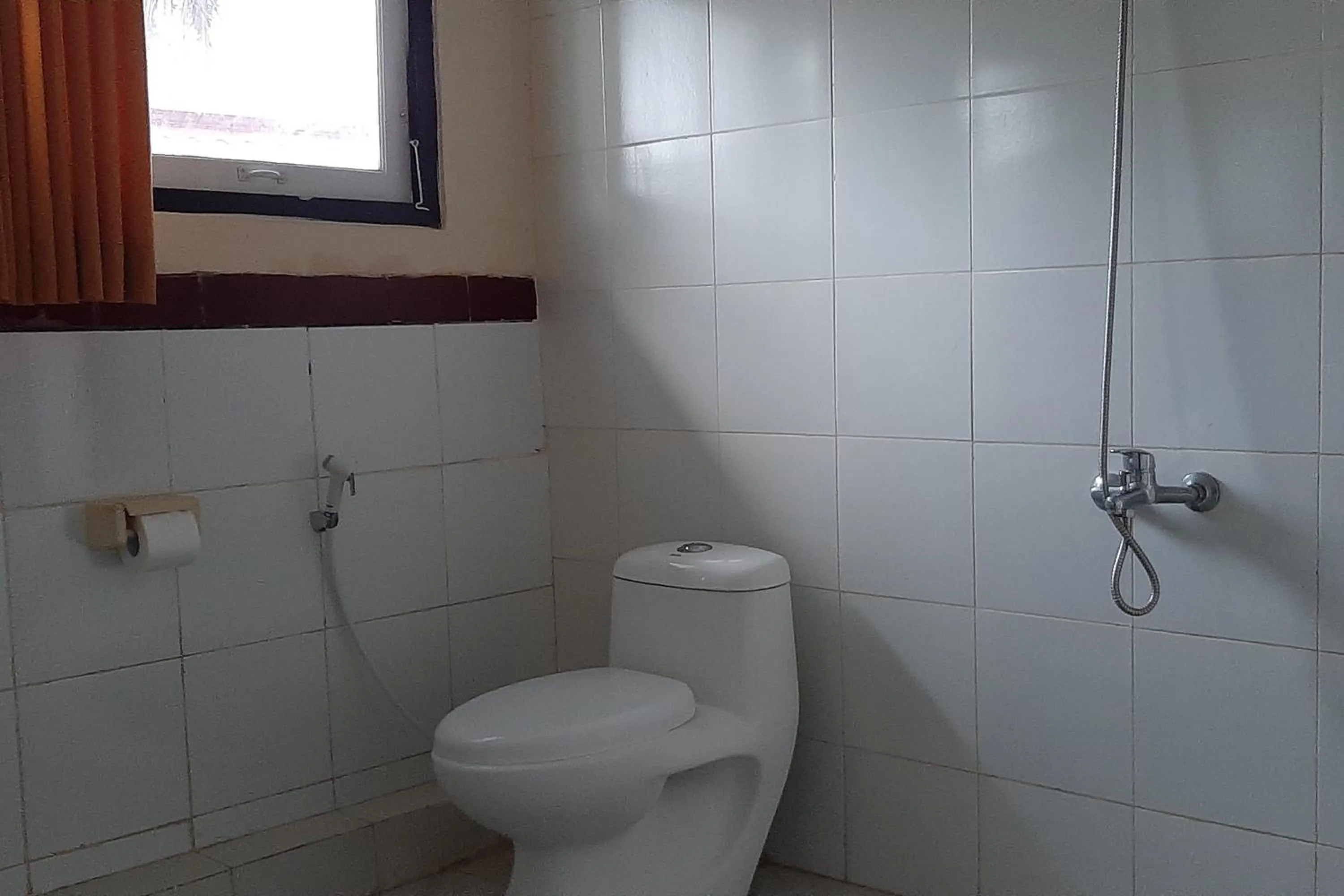 Bathroom in RedDoorz At Hotel Pakem Sari Kaliurang