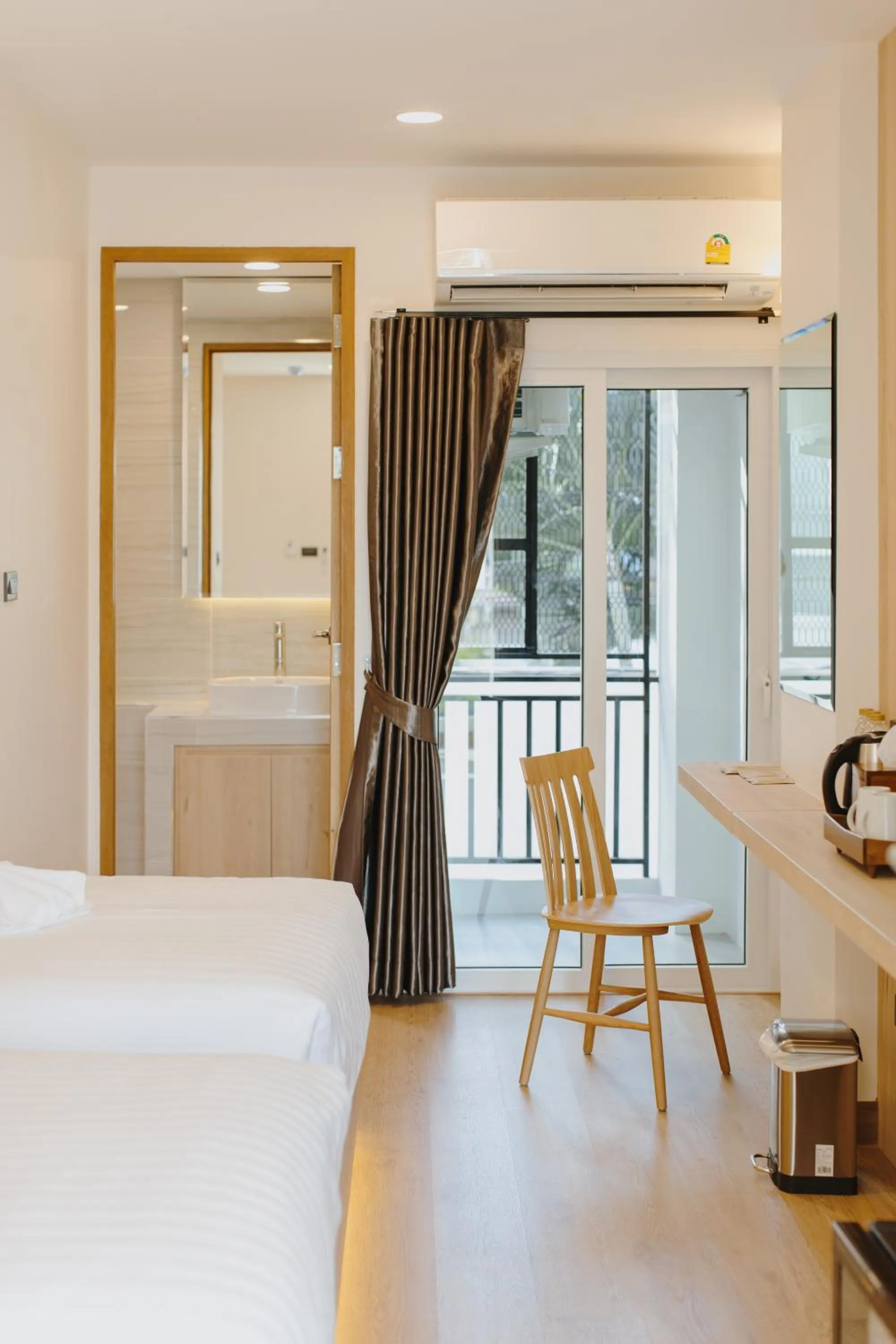 Seating area, Bed in Poodson Hotel Chiangmai