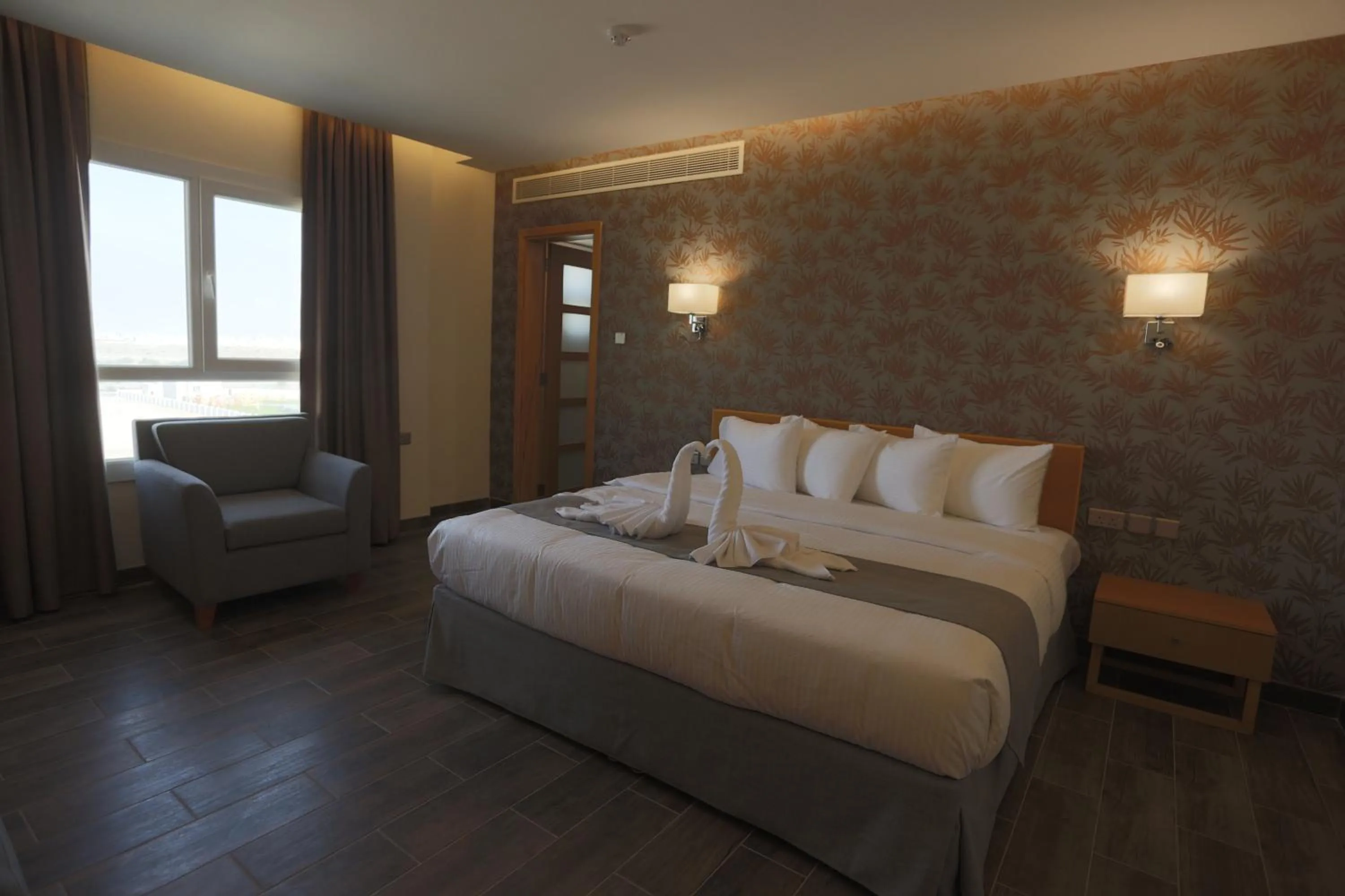 Bedroom, Bed in Sama Muscat Hotel