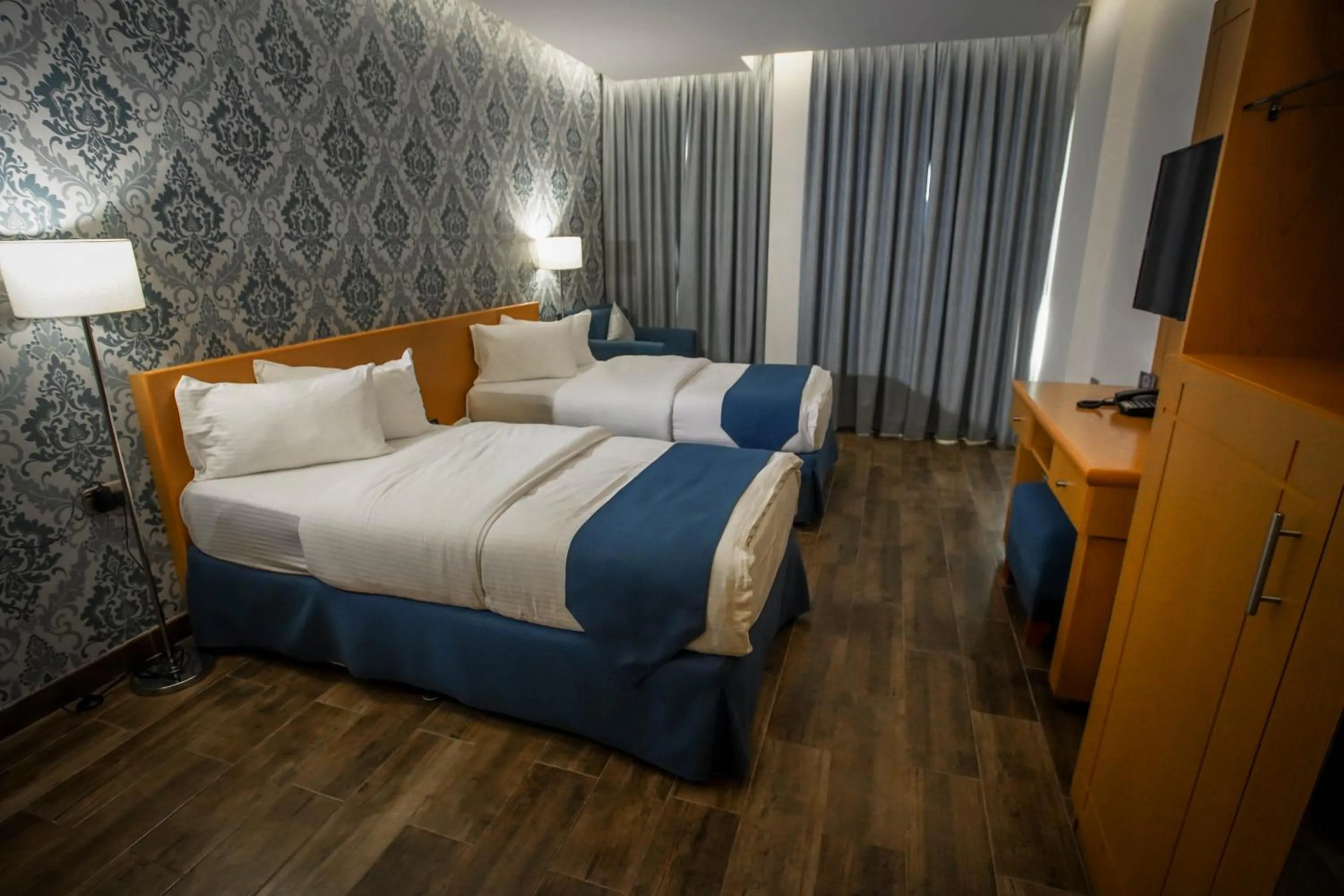 Photo of the whole room, Bed in Sama Muscat Hotel