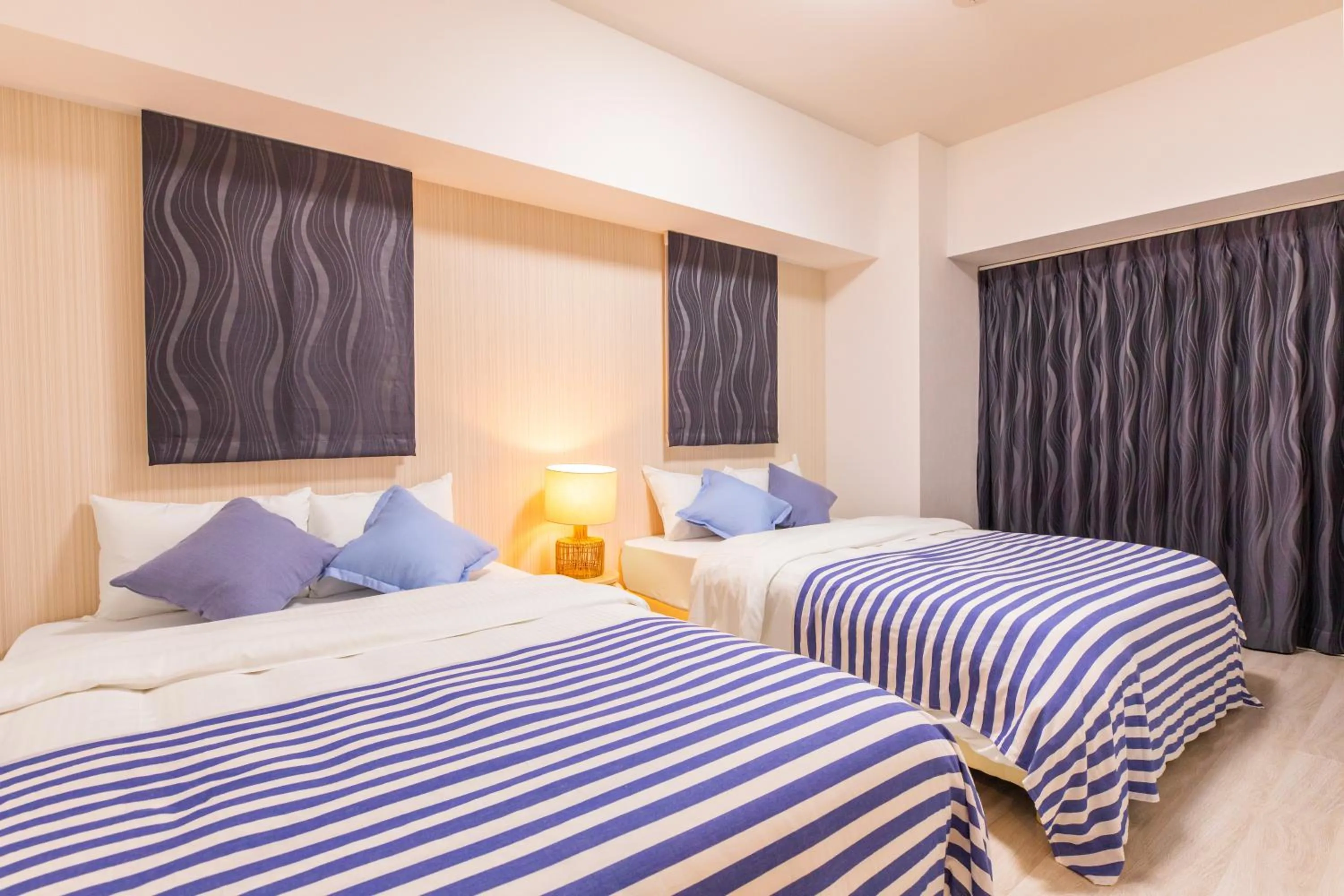 Bed in Rizo Zaizen Hotel