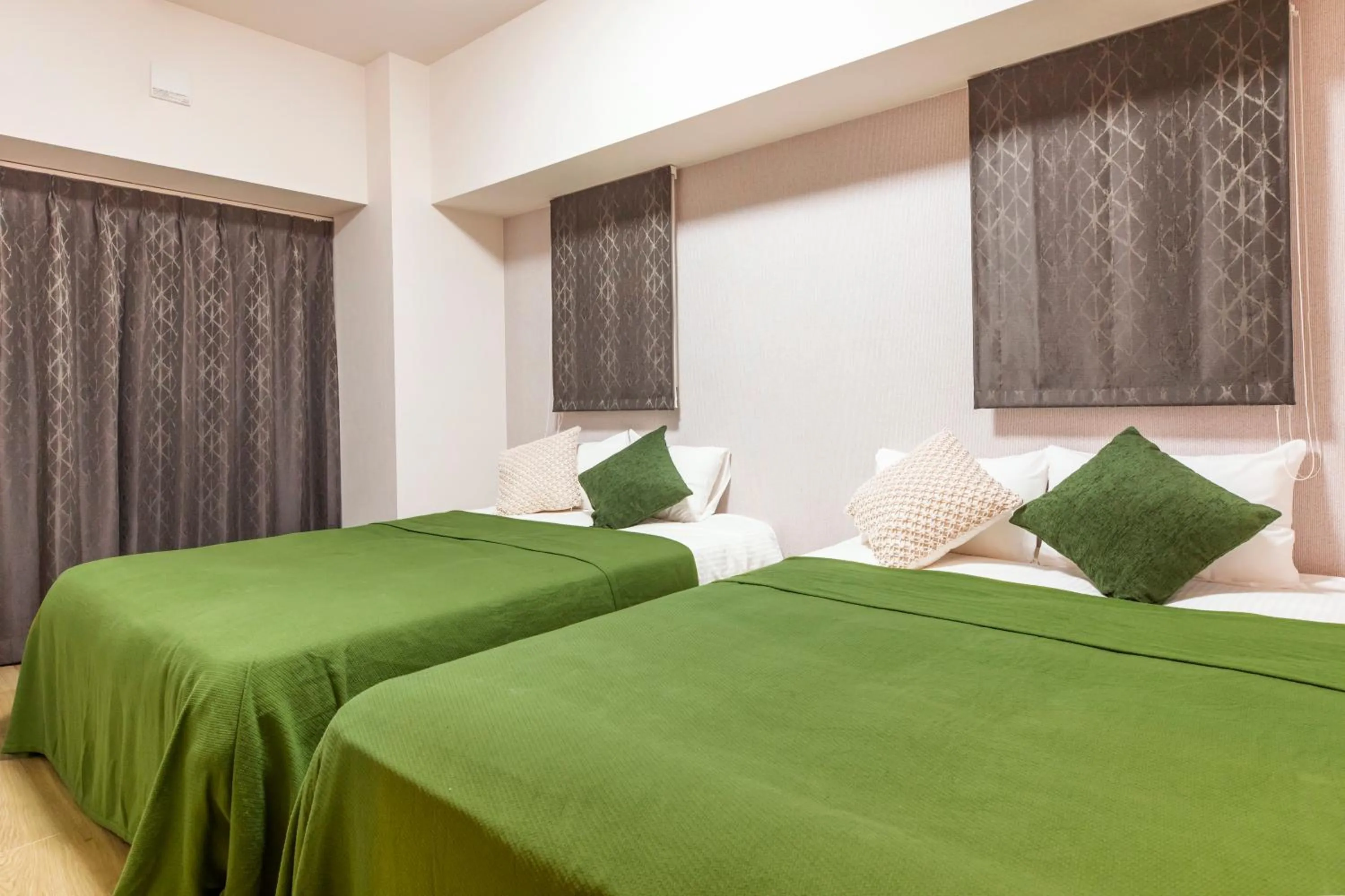 Bed in Rizo Zaizen Hotel