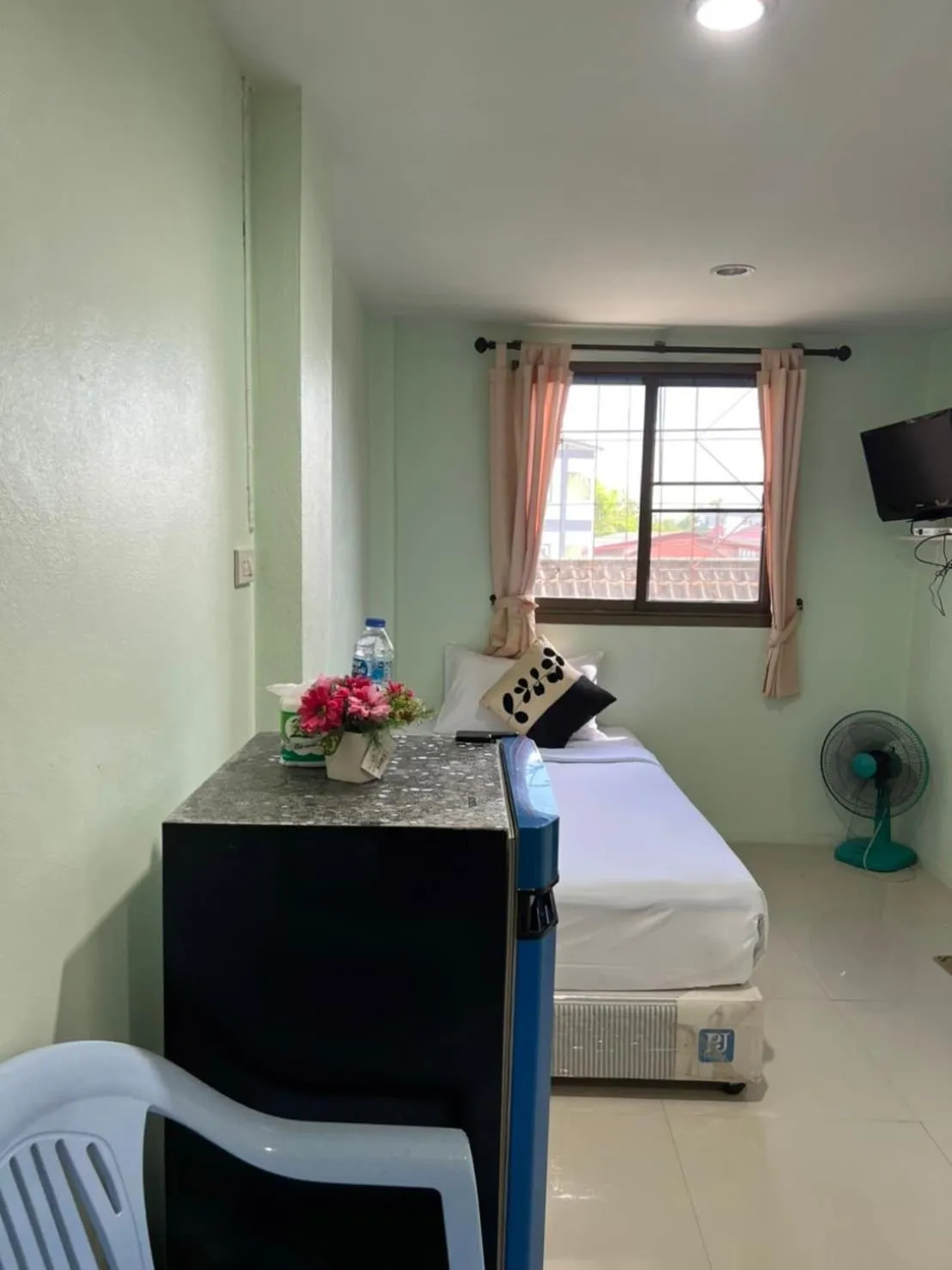 Bedroom in OYO 75377 Check In House