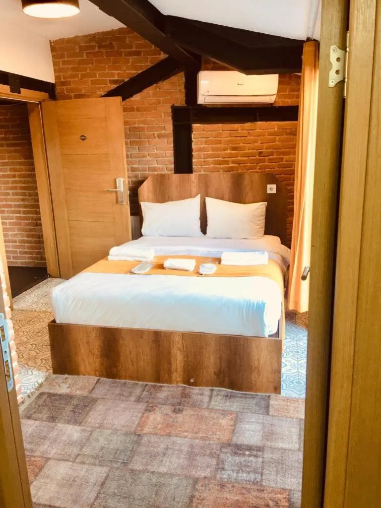 Bedroom in Gen Suites Cibali