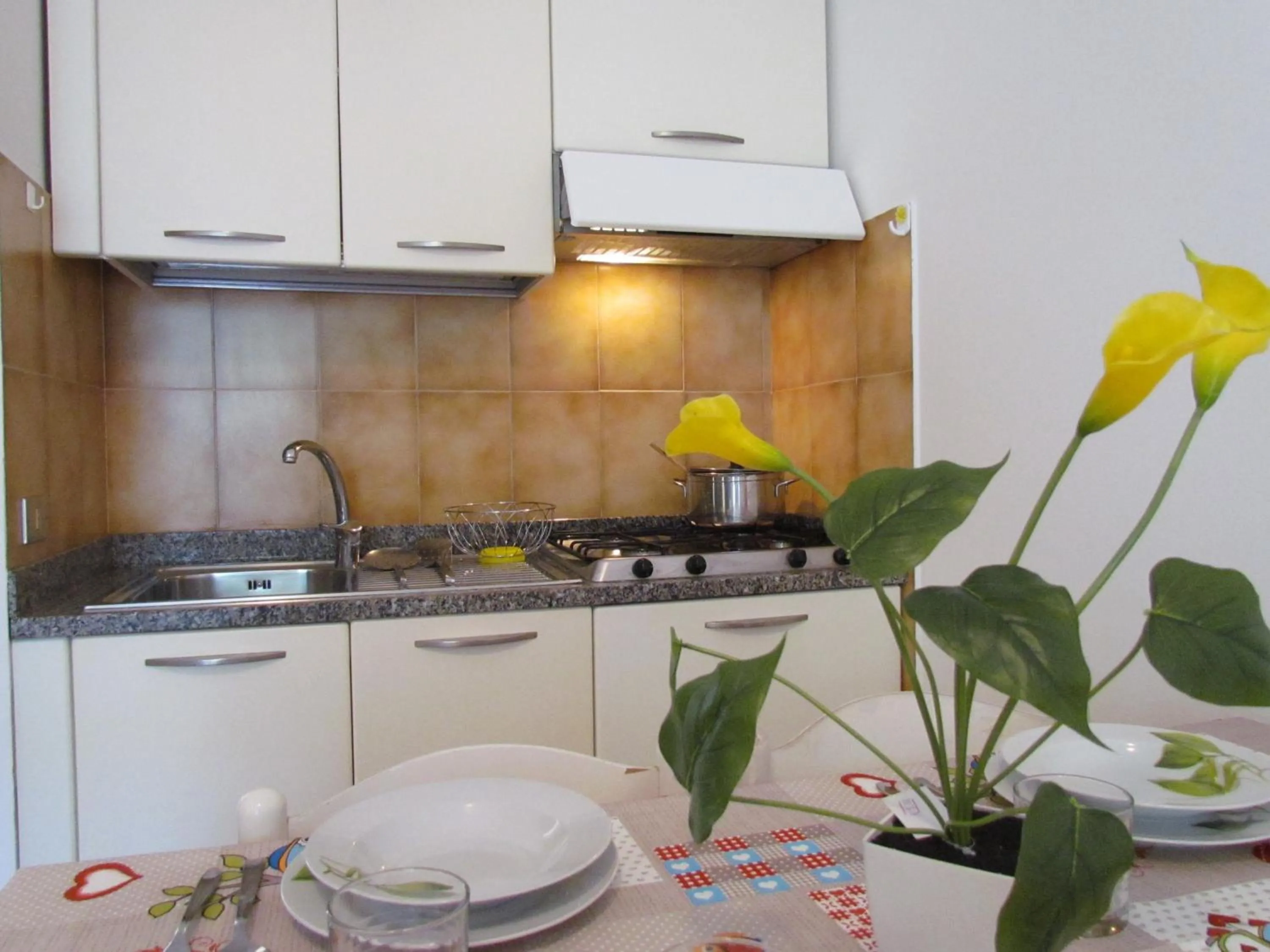 kitchen in Holiday in Bibione by the beach-Beahost