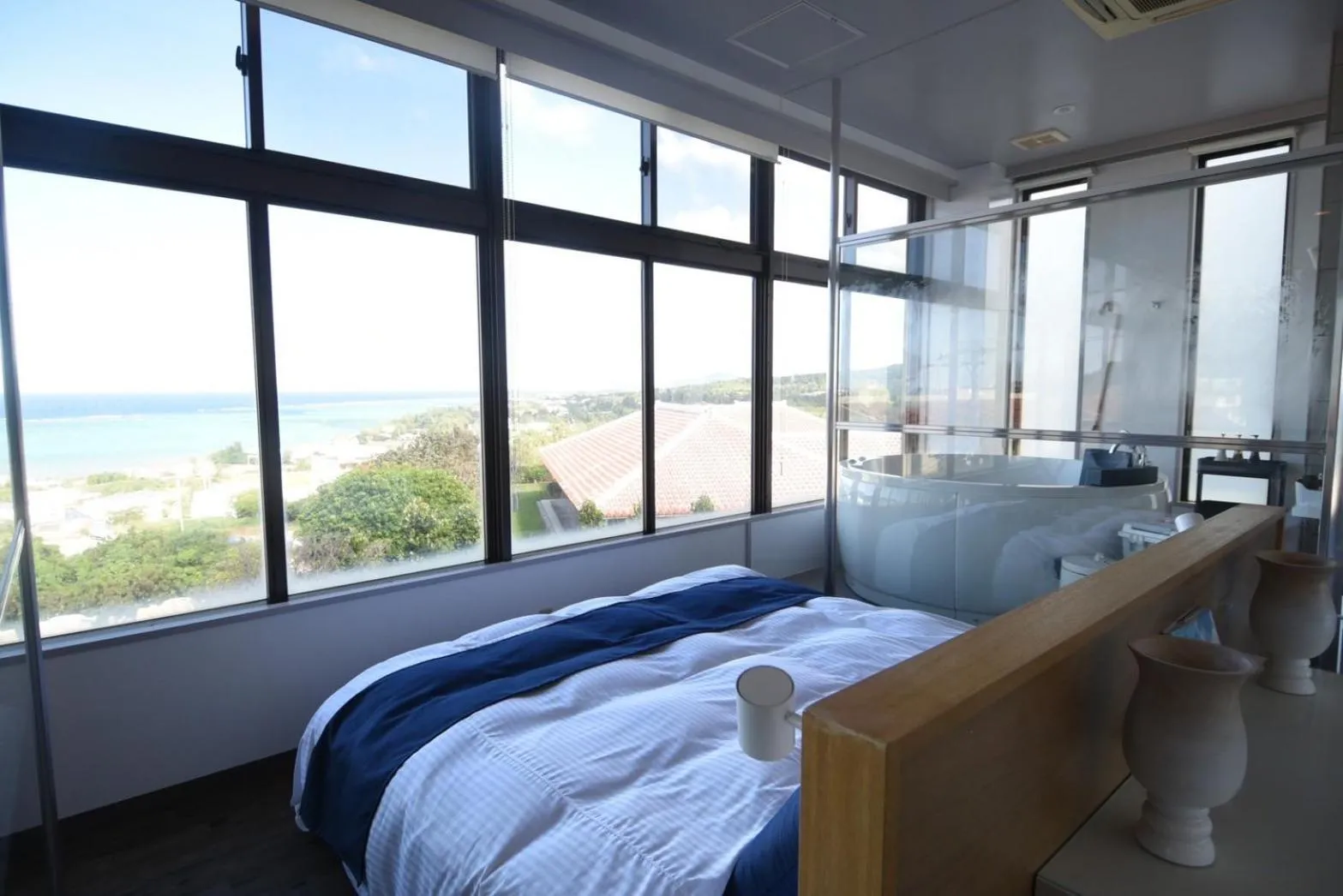 Bed in FIRST STREET Okinawa Yomitan-son Oceans -SEVEN Hotels and Resorts-