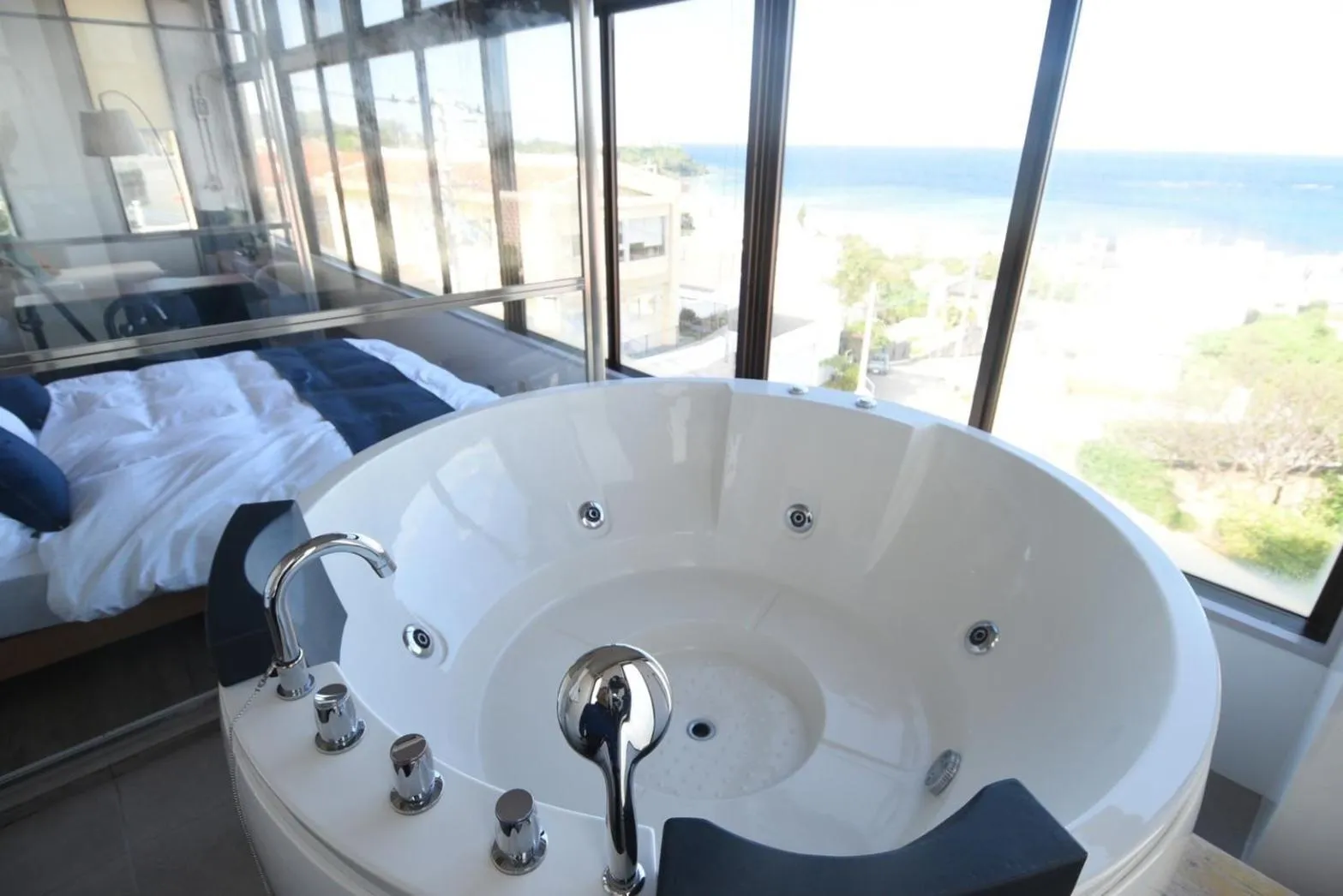 Bed in FIRST STREET Okinawa Yomitan-son Oceans -SEVEN Hotels and Resorts-