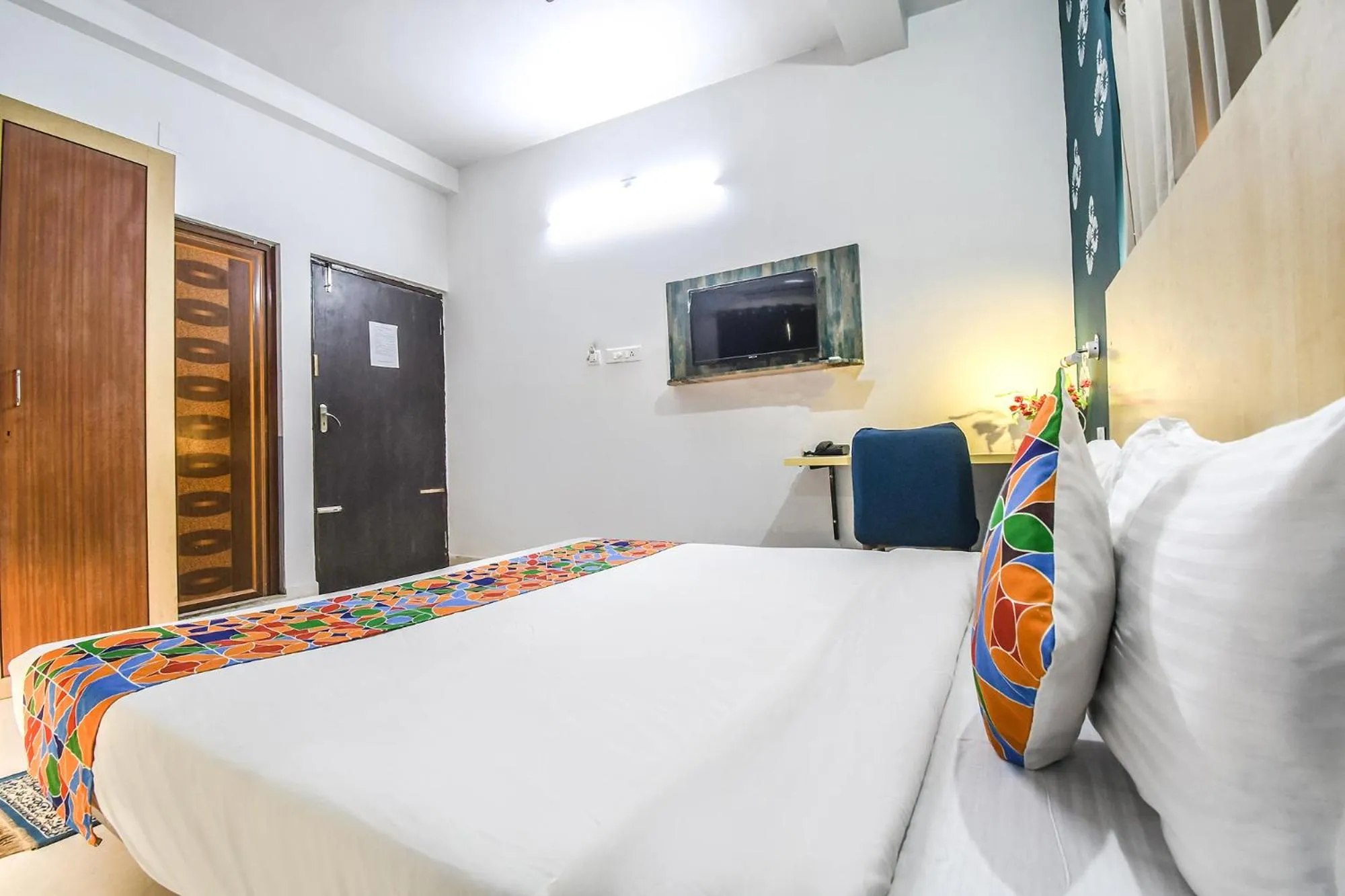 Bed in FabHotel Welcome Inn I - Nr DN Regalia Mall