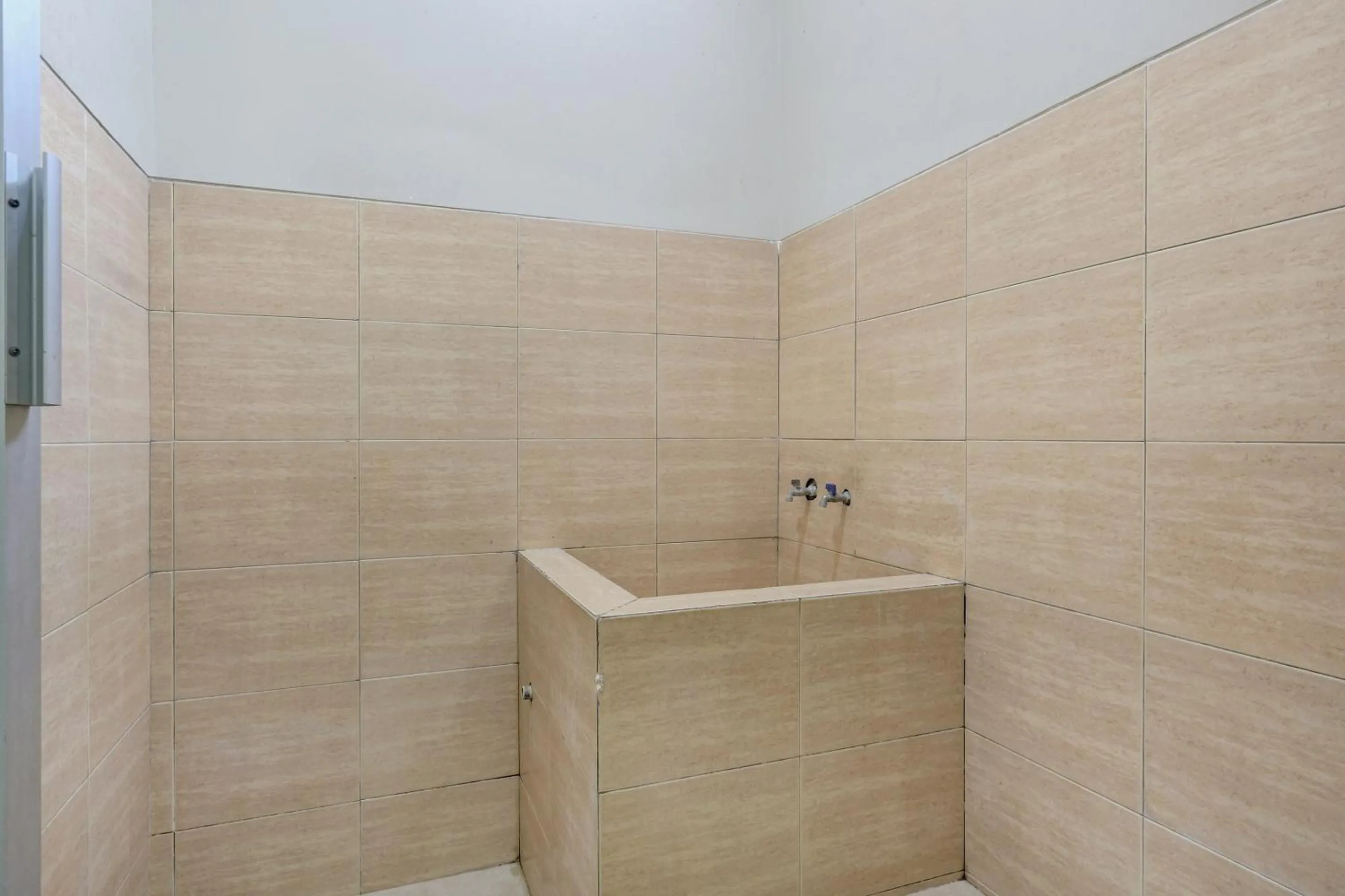 Bedroom in OYO Life 90159 Puri Asoka Guest House