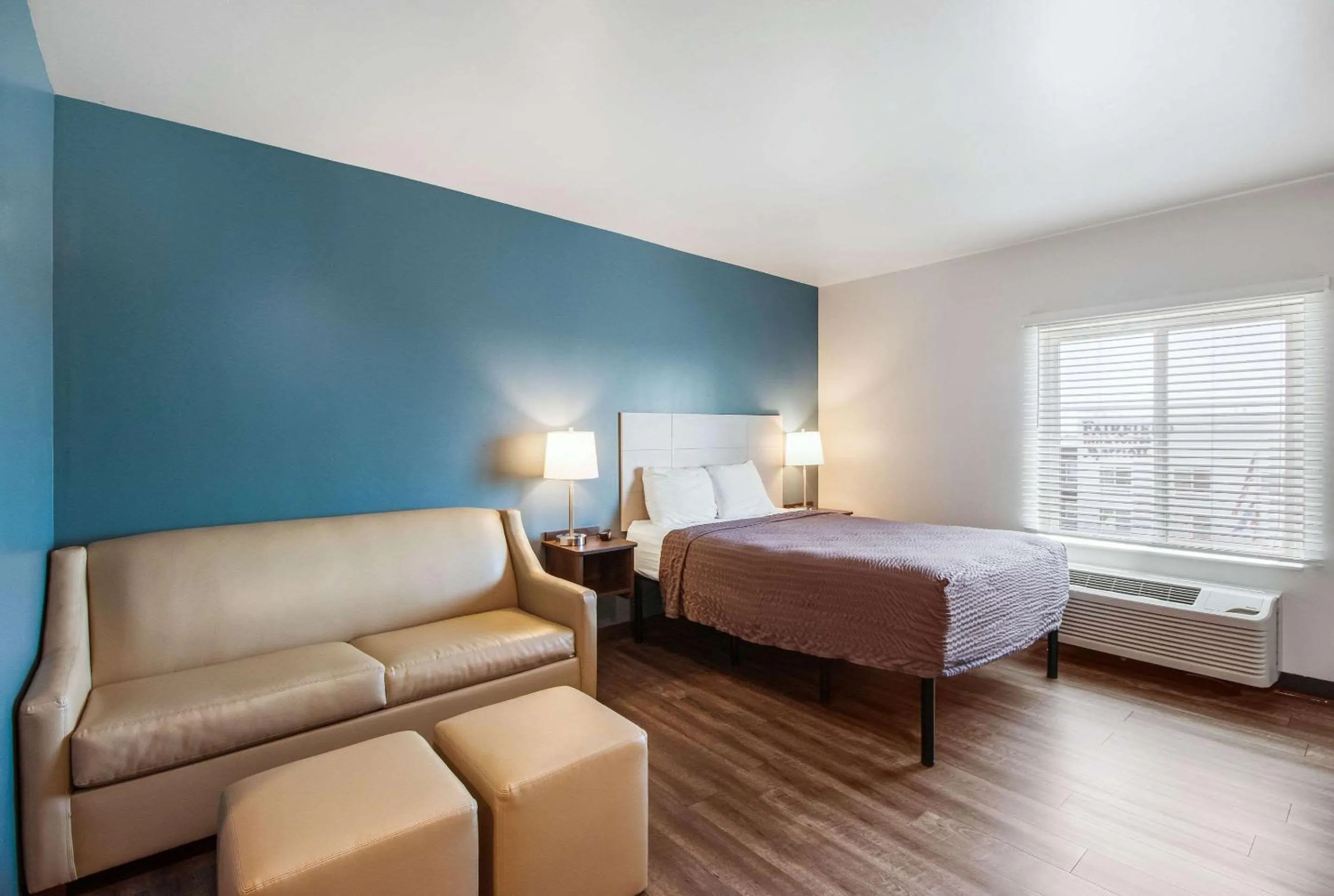 Photo of the whole room, Bed in WoodSpring Suites Bakersfield Airport