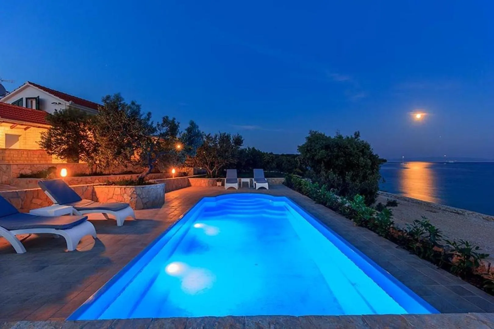 Property building in Luxury Beachfront Villa Dalmatino Trogir with private pool right at the beach in Okrug Gornji - Ciovo