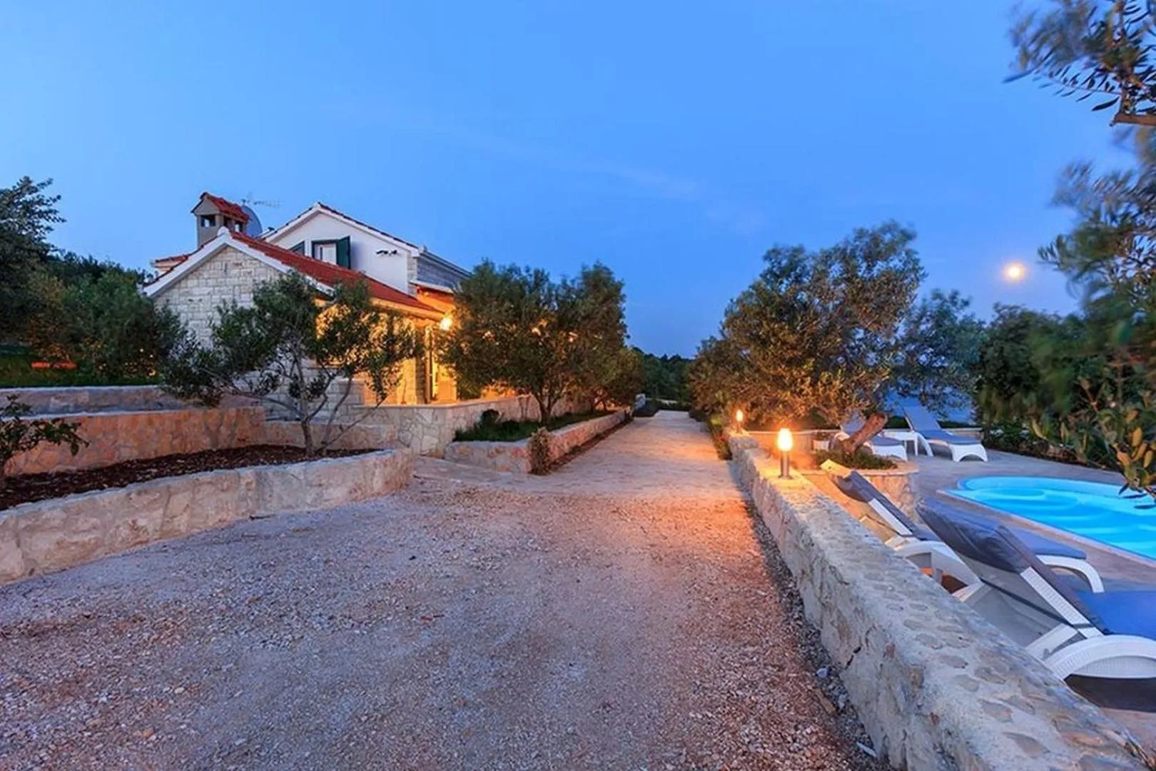 Property building in Luxury Beachfront Villa Dalmatino Trogir with private pool right at the beach in Okrug Gornji - Ciovo