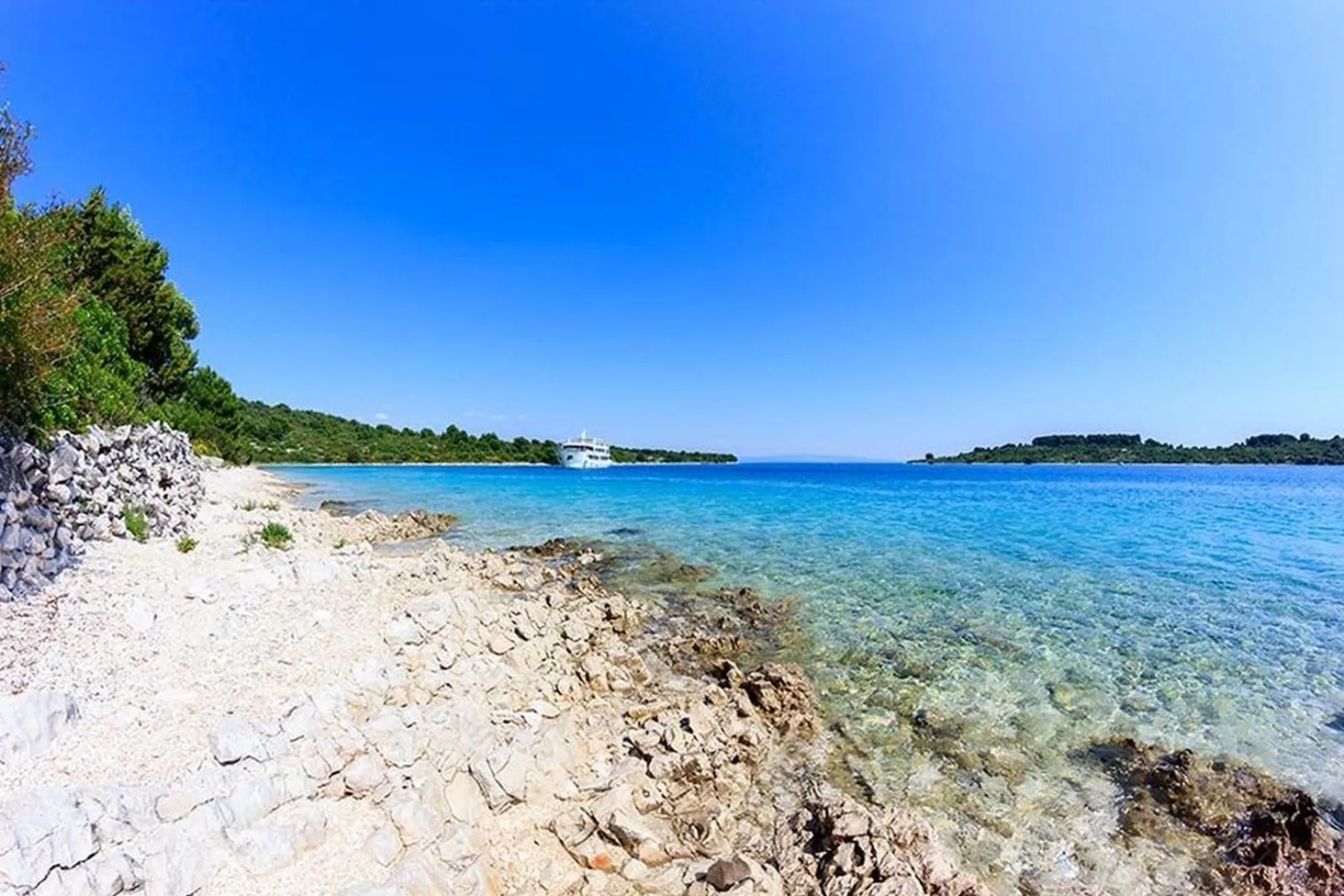 Property building in Luxury Beachfront Villa Dalmatino Trogir with private pool right at the beach in Okrug Gornji - Ciovo