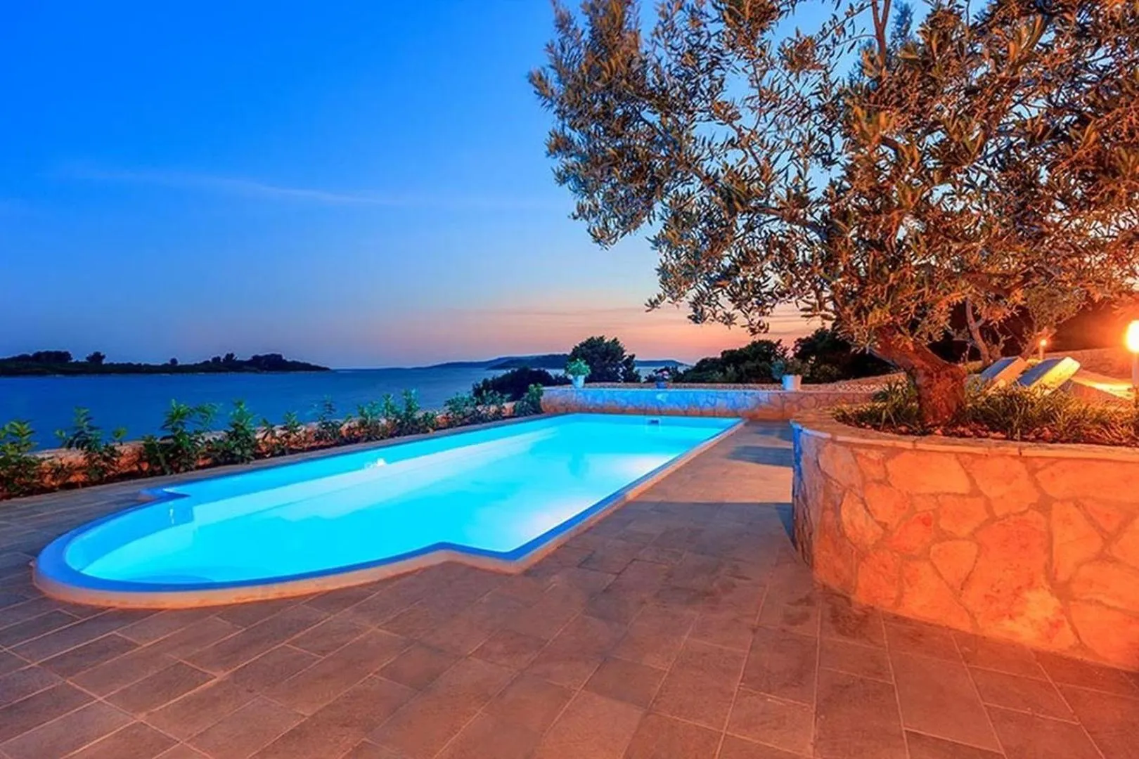Property building in Luxury Beachfront Villa Dalmatino Trogir with private pool right at the beach in Okrug Gornji - Ciovo