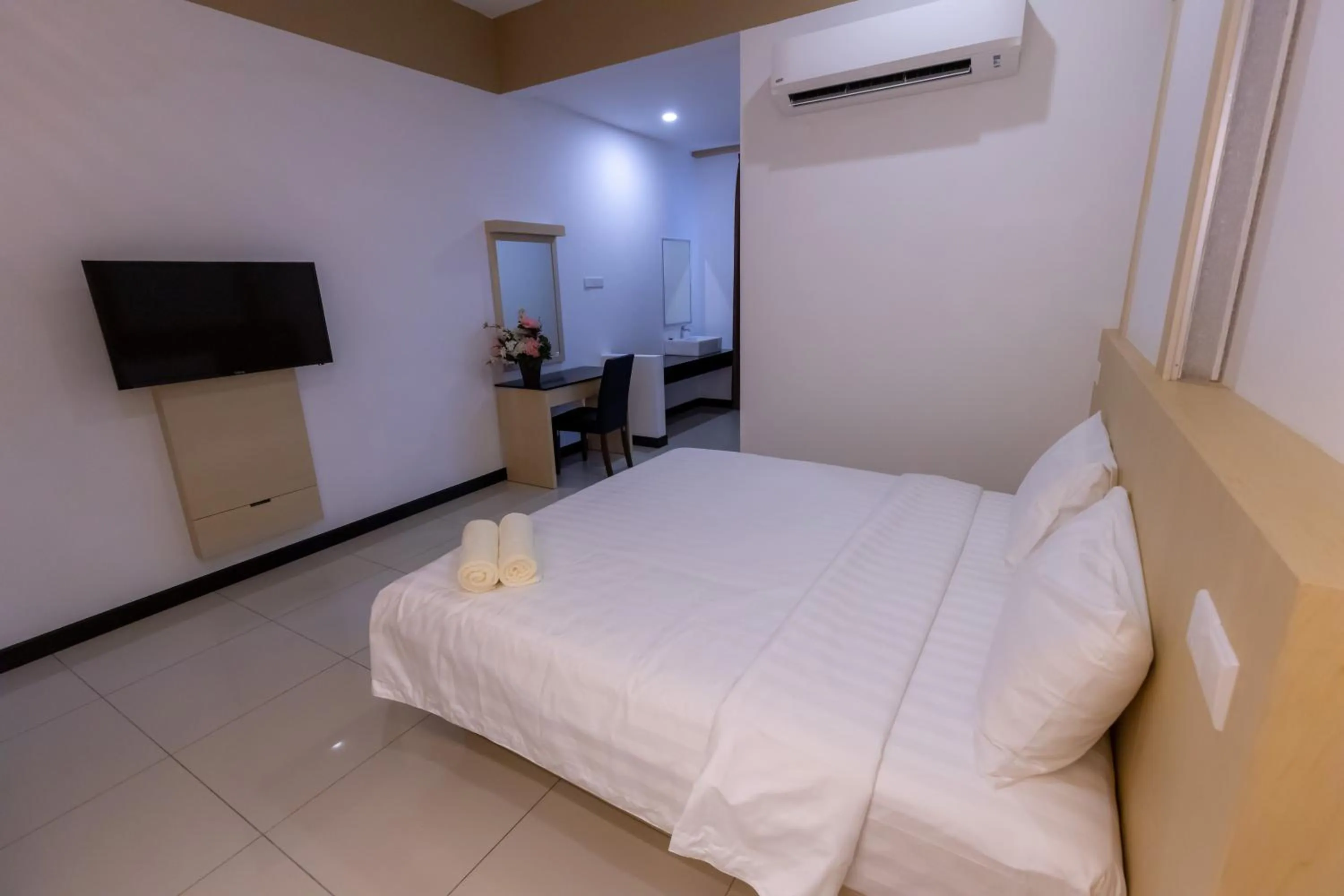 Bed in Scott Service Suites