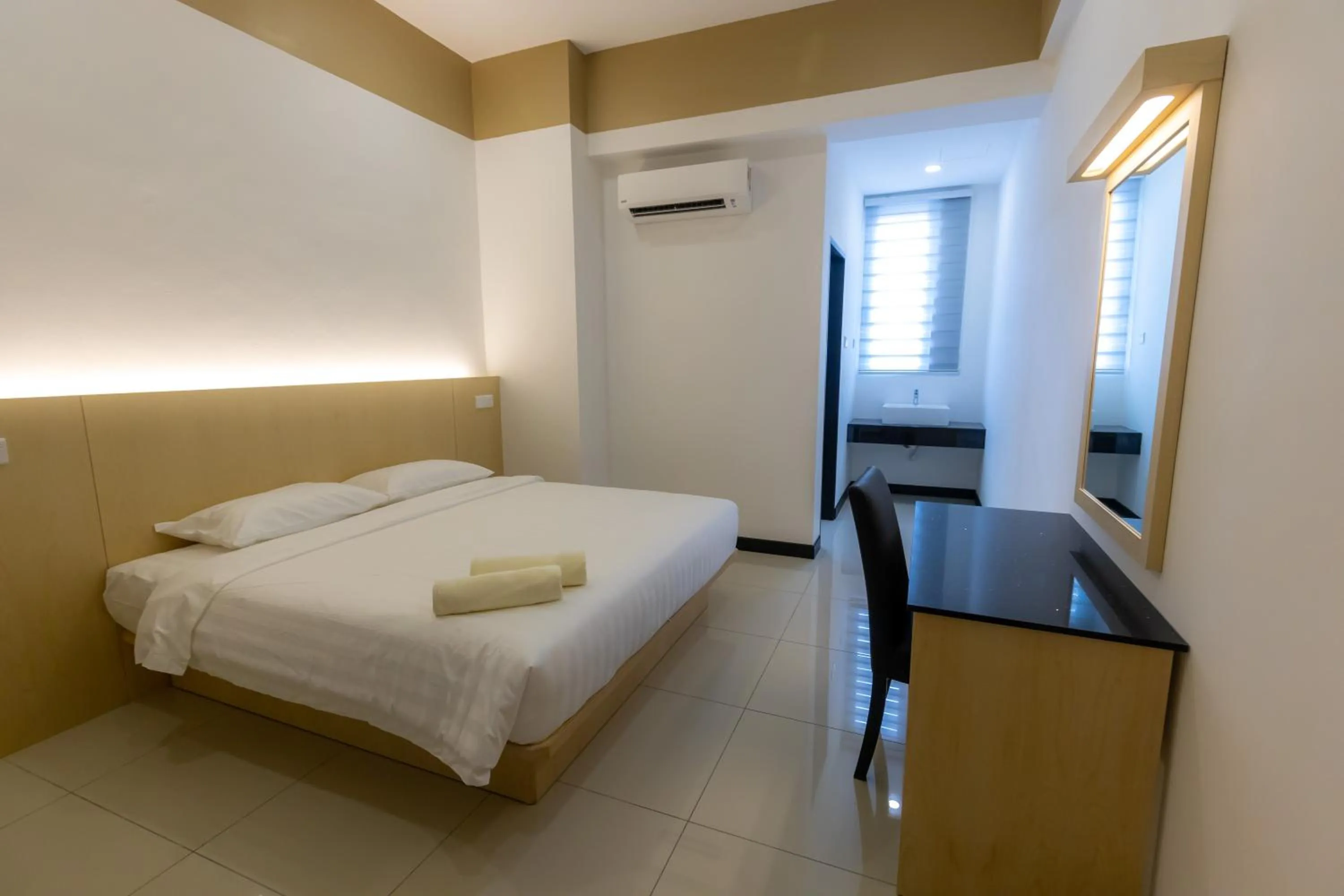 Bed in Scott Service Suites