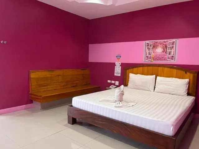 Bed in The Palm Resort Kampeang Saen