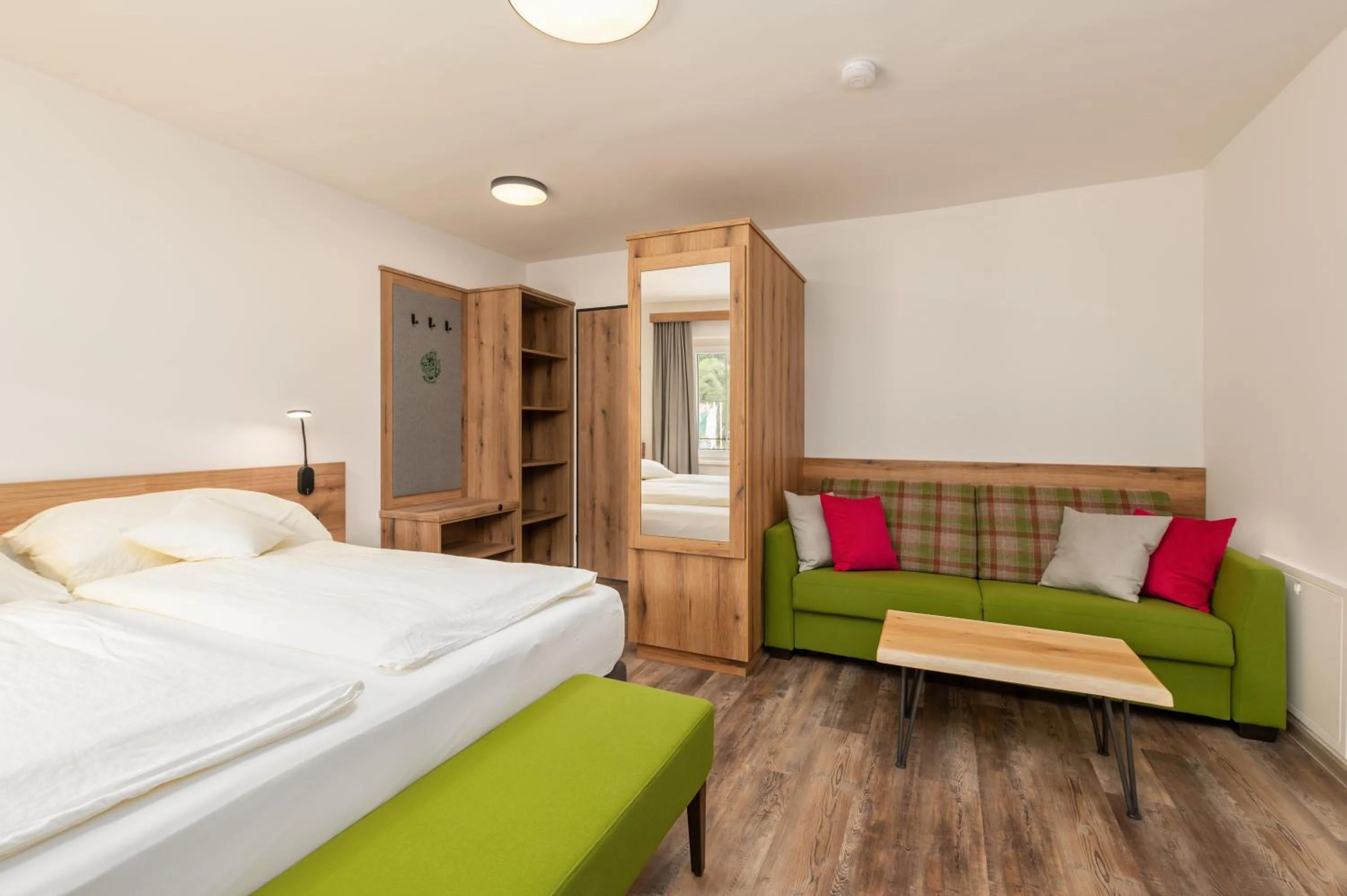 Living room, Bed in Landgasthof Bierfriedl