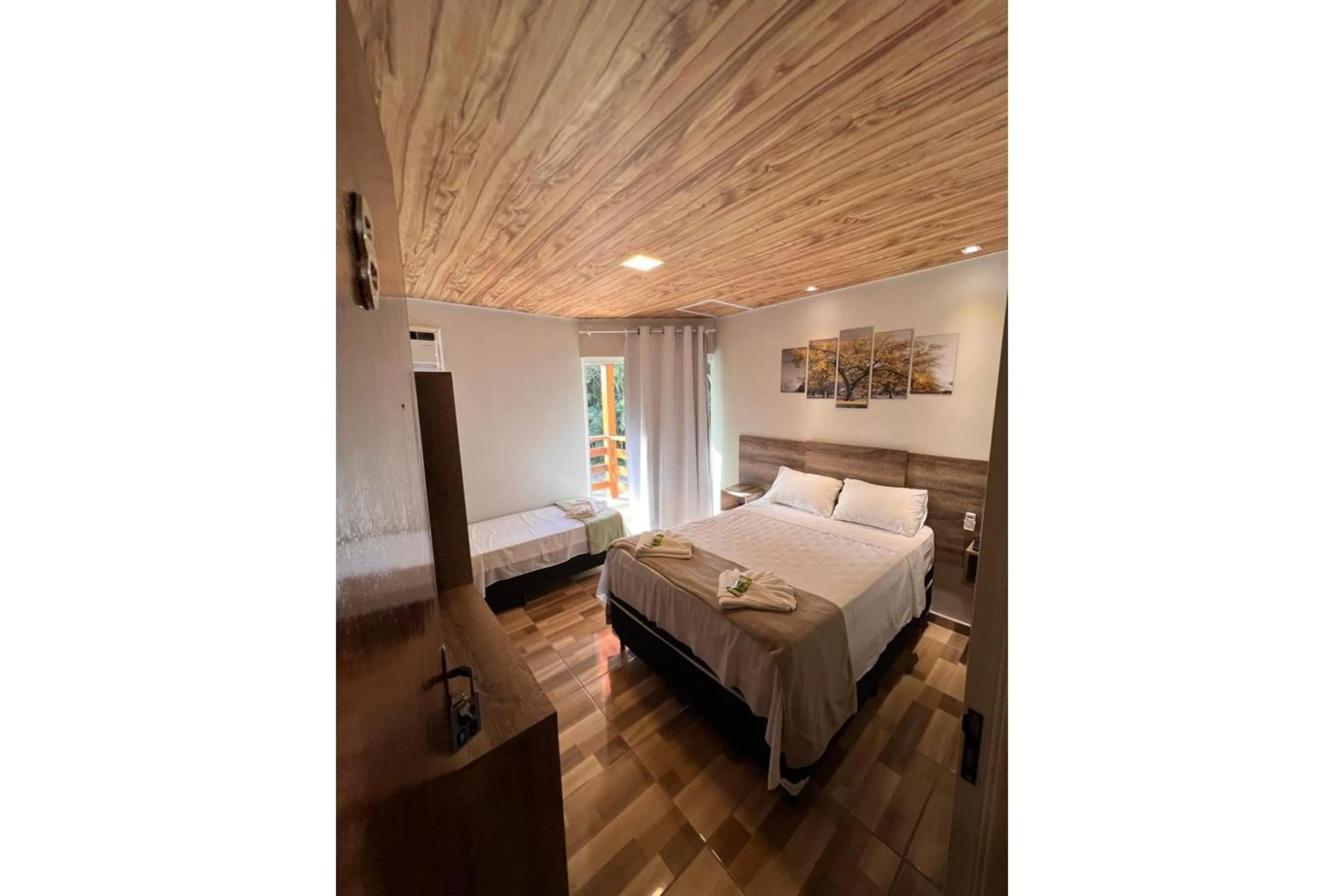 Bedroom in OYO Pousada Coisa Mais Linda