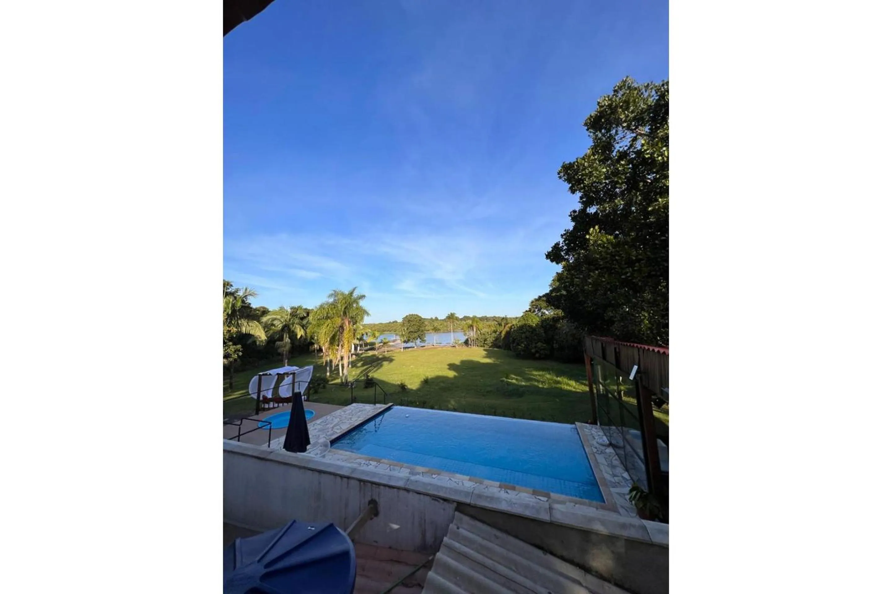 Swimming pool in OYO Pousada Coisa Mais Linda