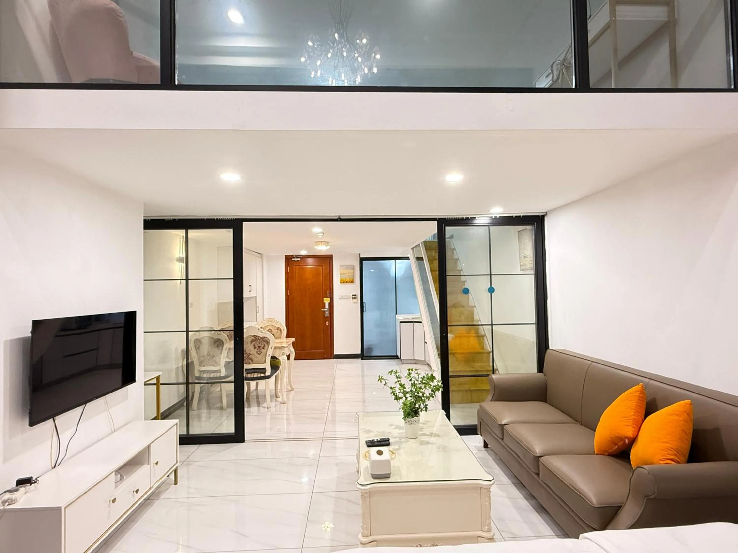 Living room in Barton International Residence Guangzhou - located in the city center adjacent to Beijing Road Pedestrian Street and Dafo Temple and close to the subway