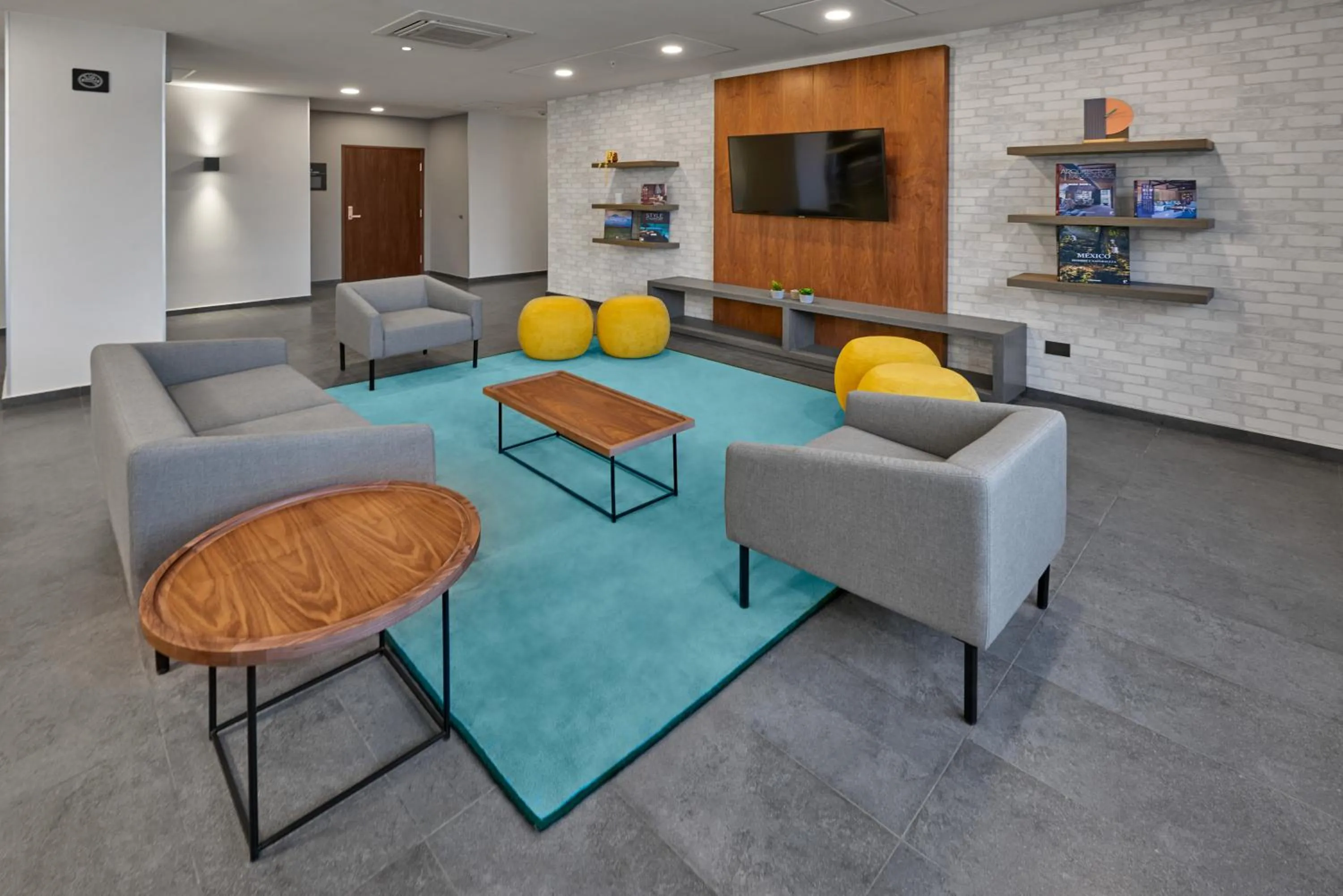 Seating area in City Express by Marriott Caborca