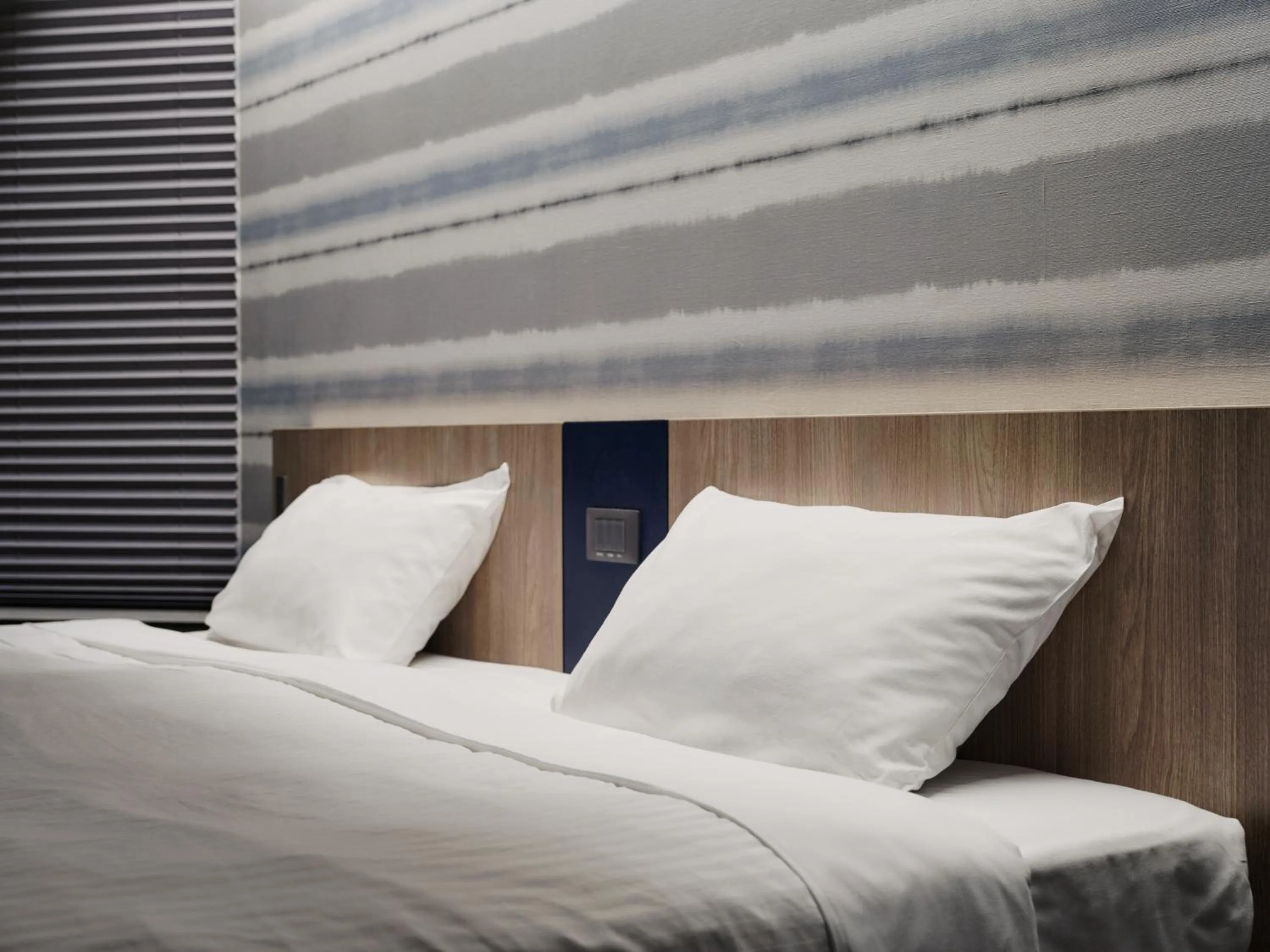 Bed in MONday Apart Premium Ginza Shintomicho