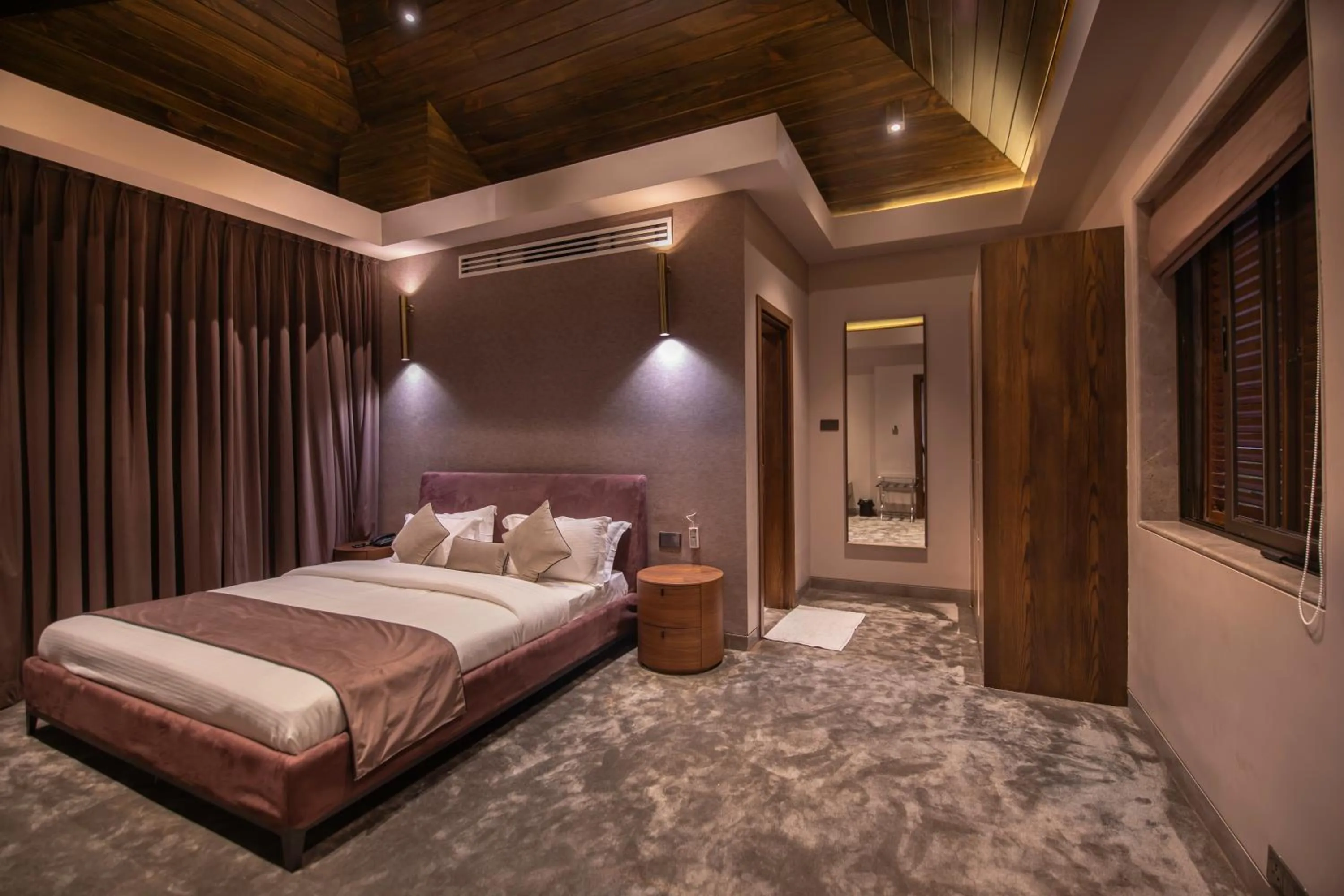 Bed in Leela Resort, The Exotic Boutique Hotel - Pure Veg