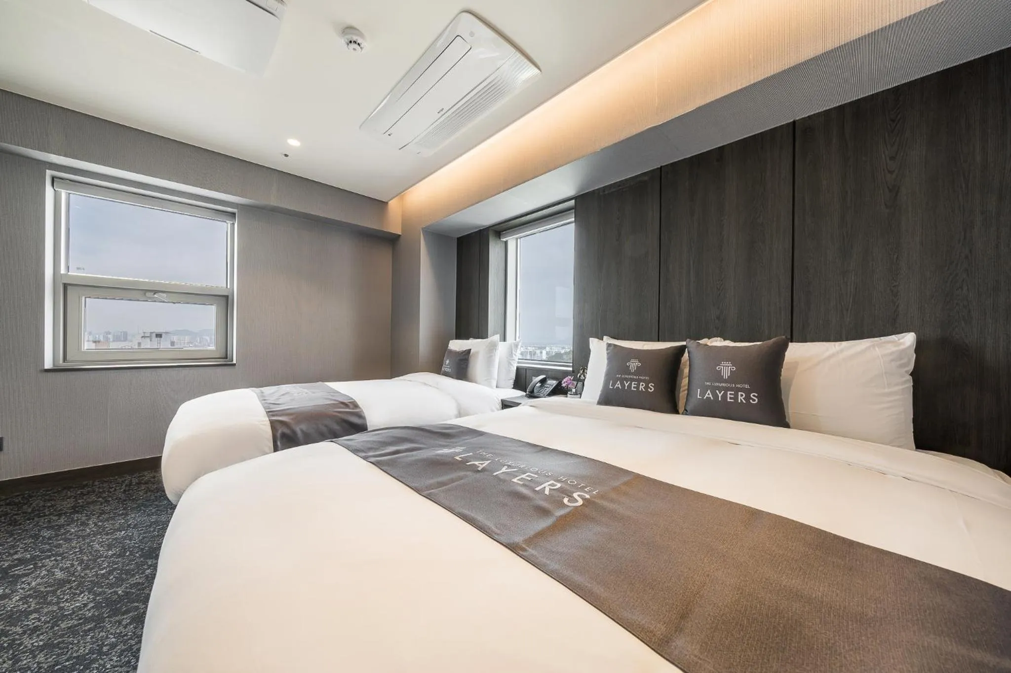 Bed in Layers Hotel Busan Hadan
