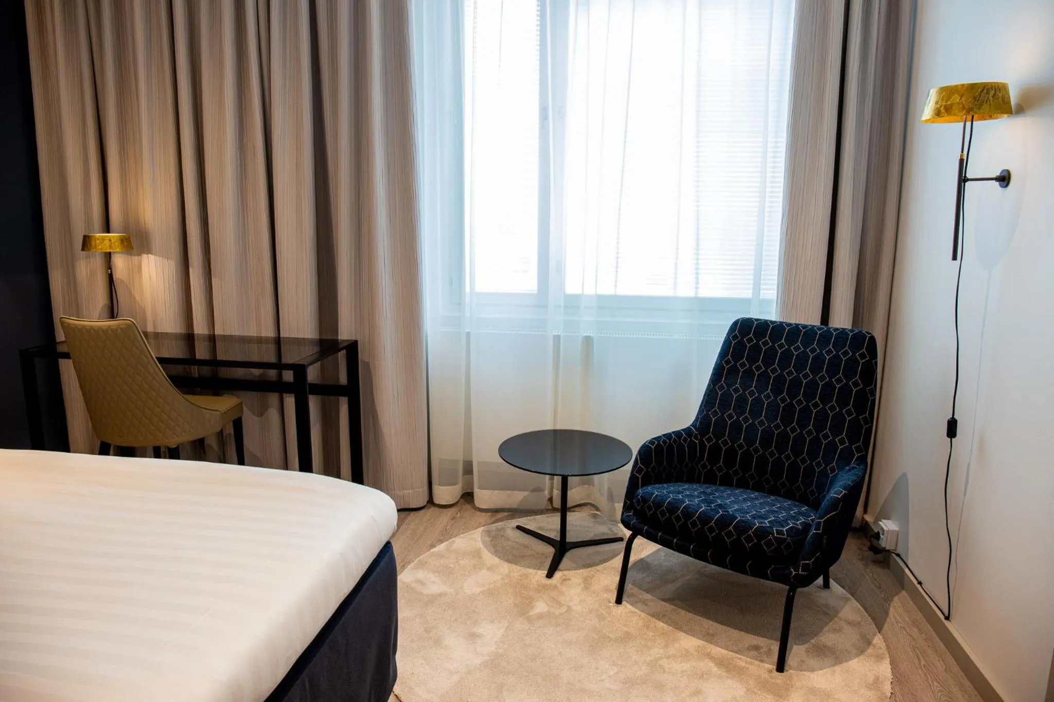 Seating area, Bed in Hotel Matts