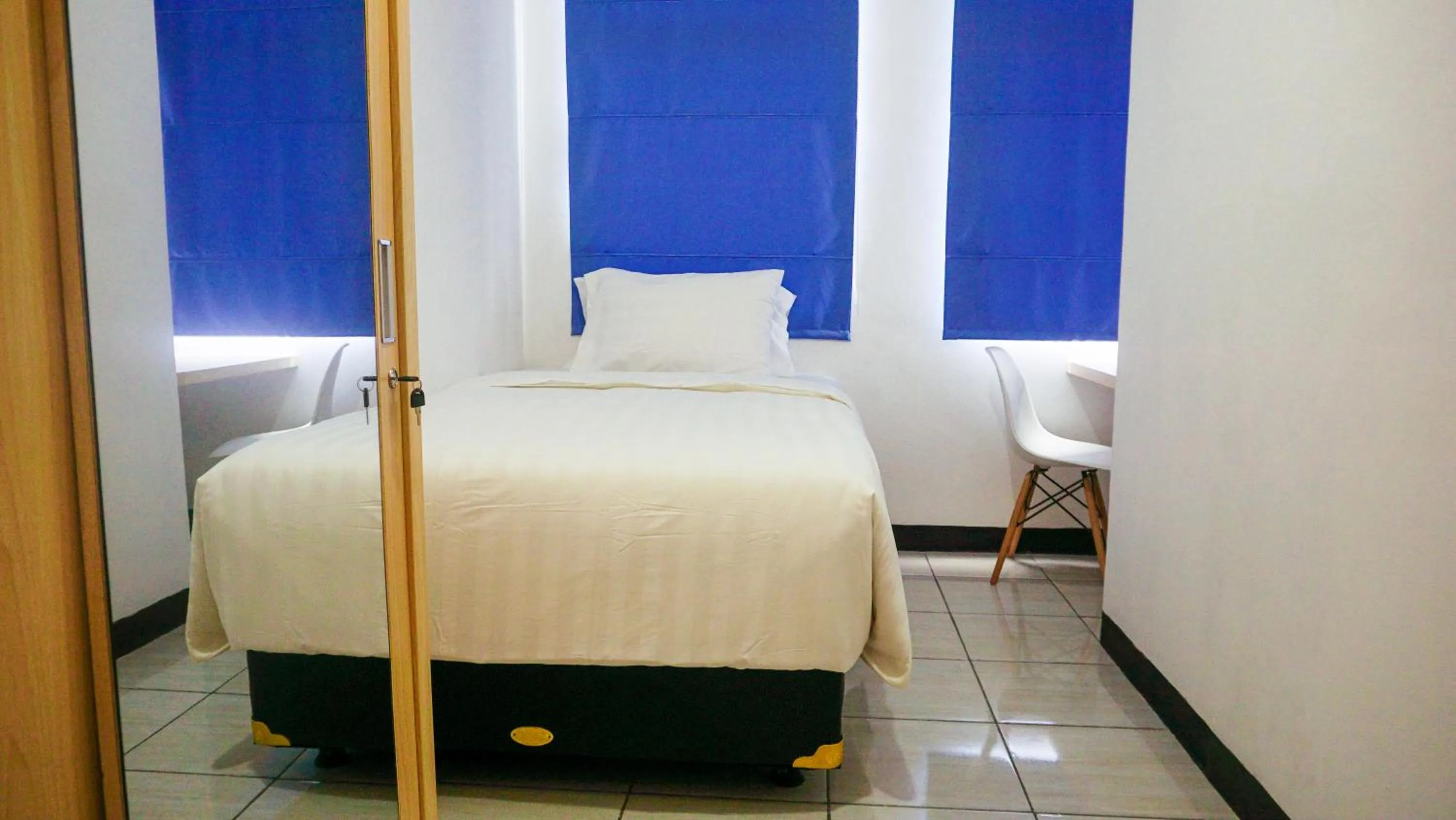 Bedroom, Bed in Cordova Suites