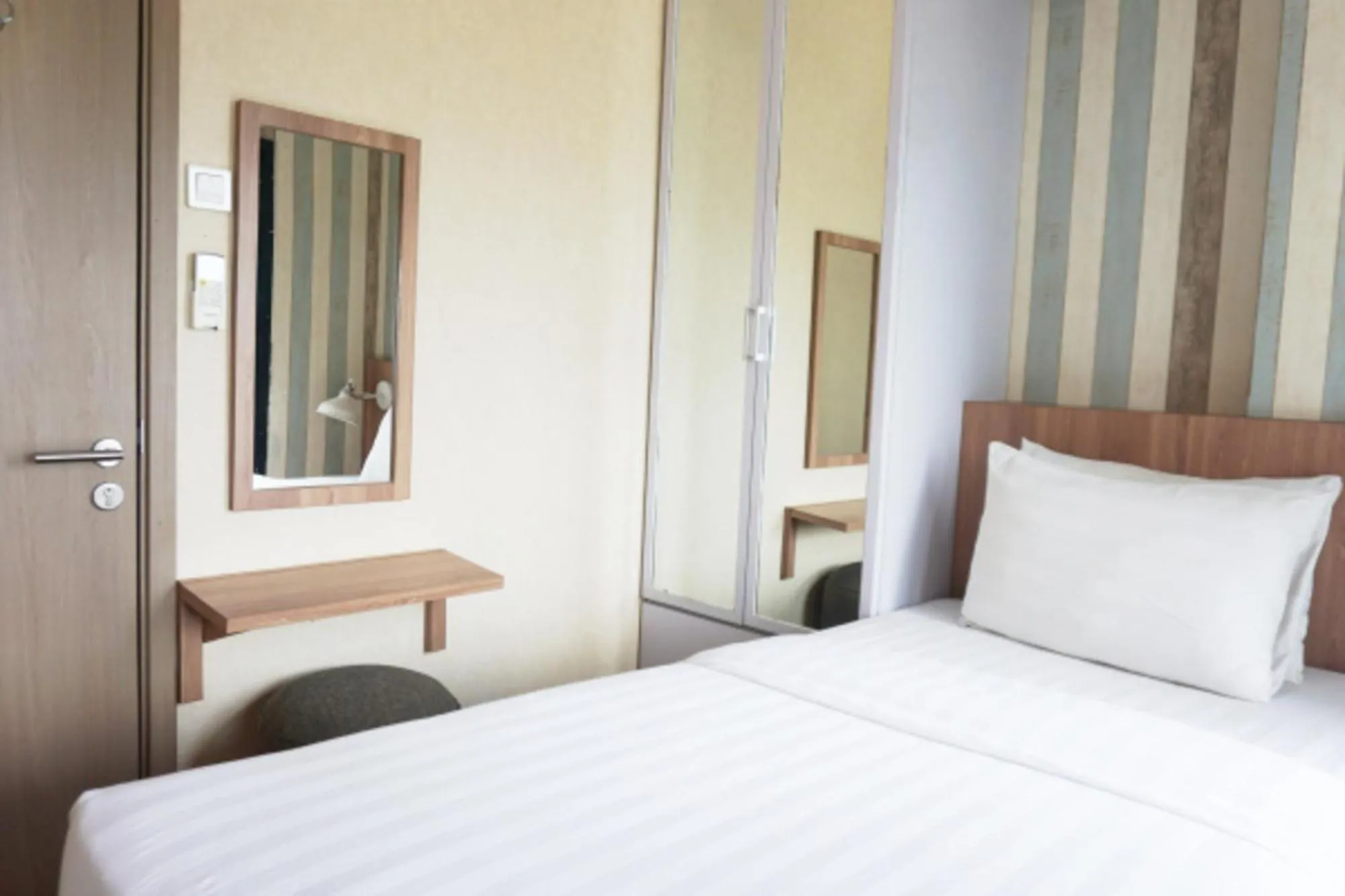 Bed in Cordova Suites