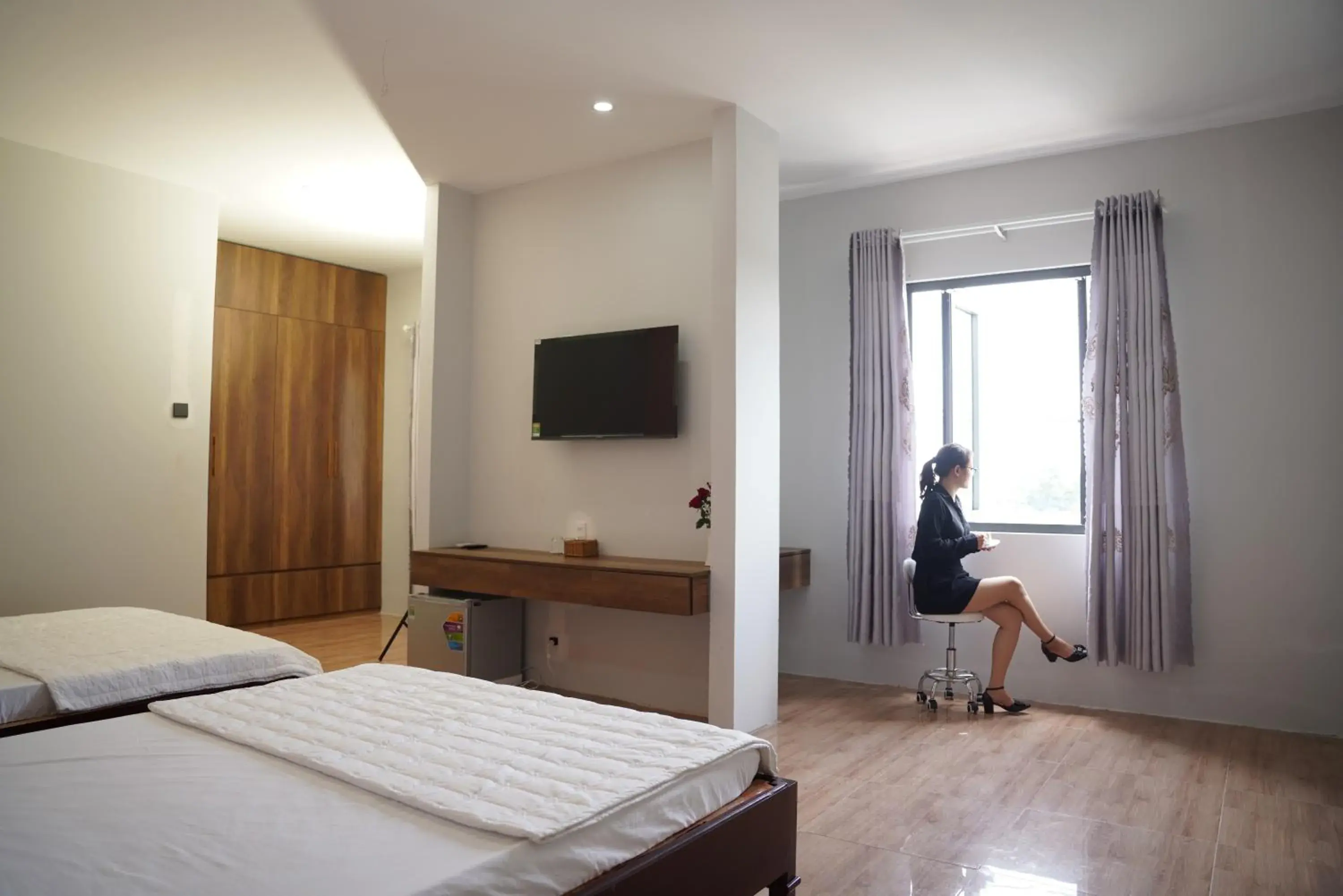 Deluxe Quadruple Room in KHÁCH SẠN ĐẾ VƯƠNG Deluxe Quadruple Room in KHÁCH SẠN ĐẾ VƯƠNG