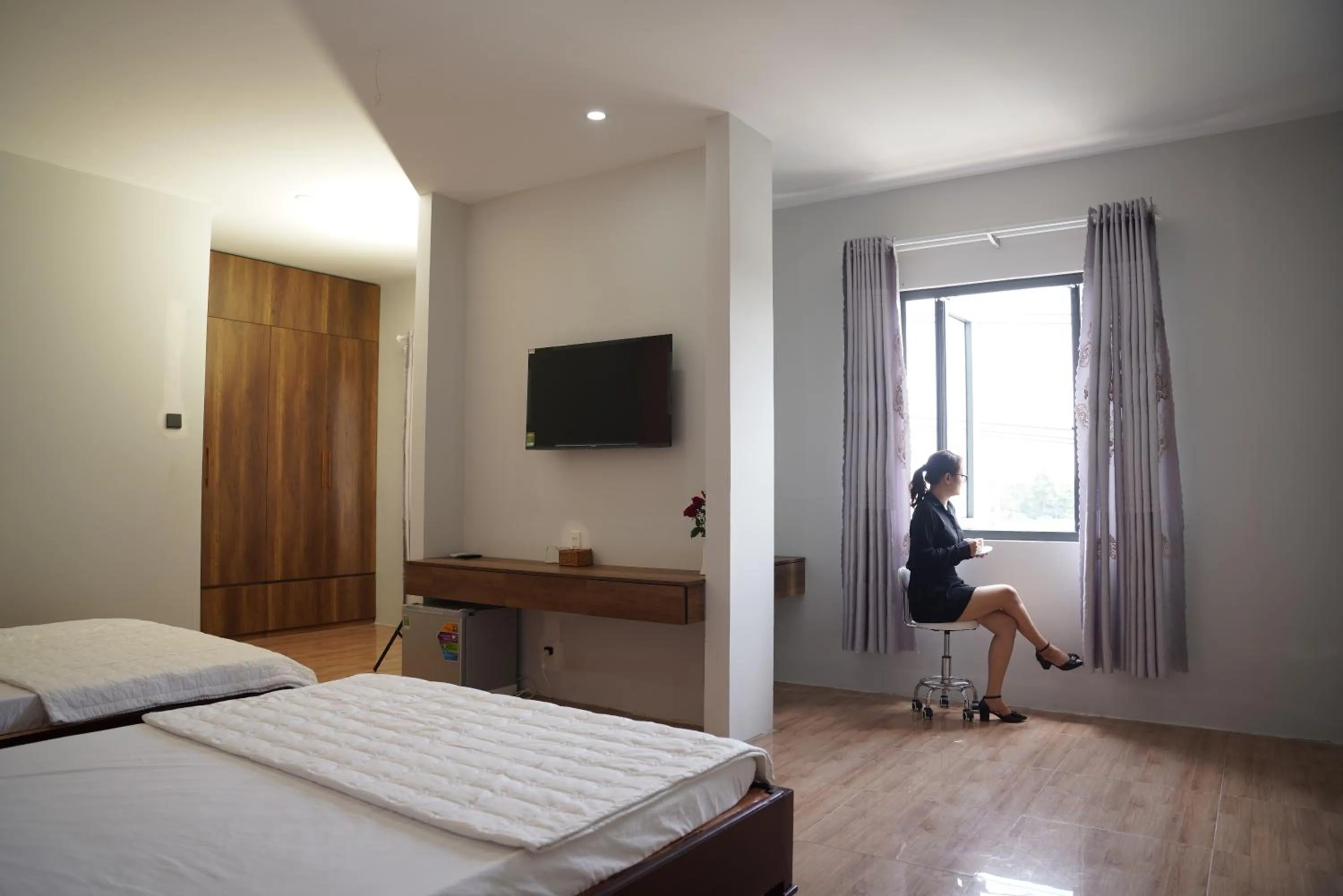 Bed in KHÁCH SẠN ĐẾ VƯƠNG