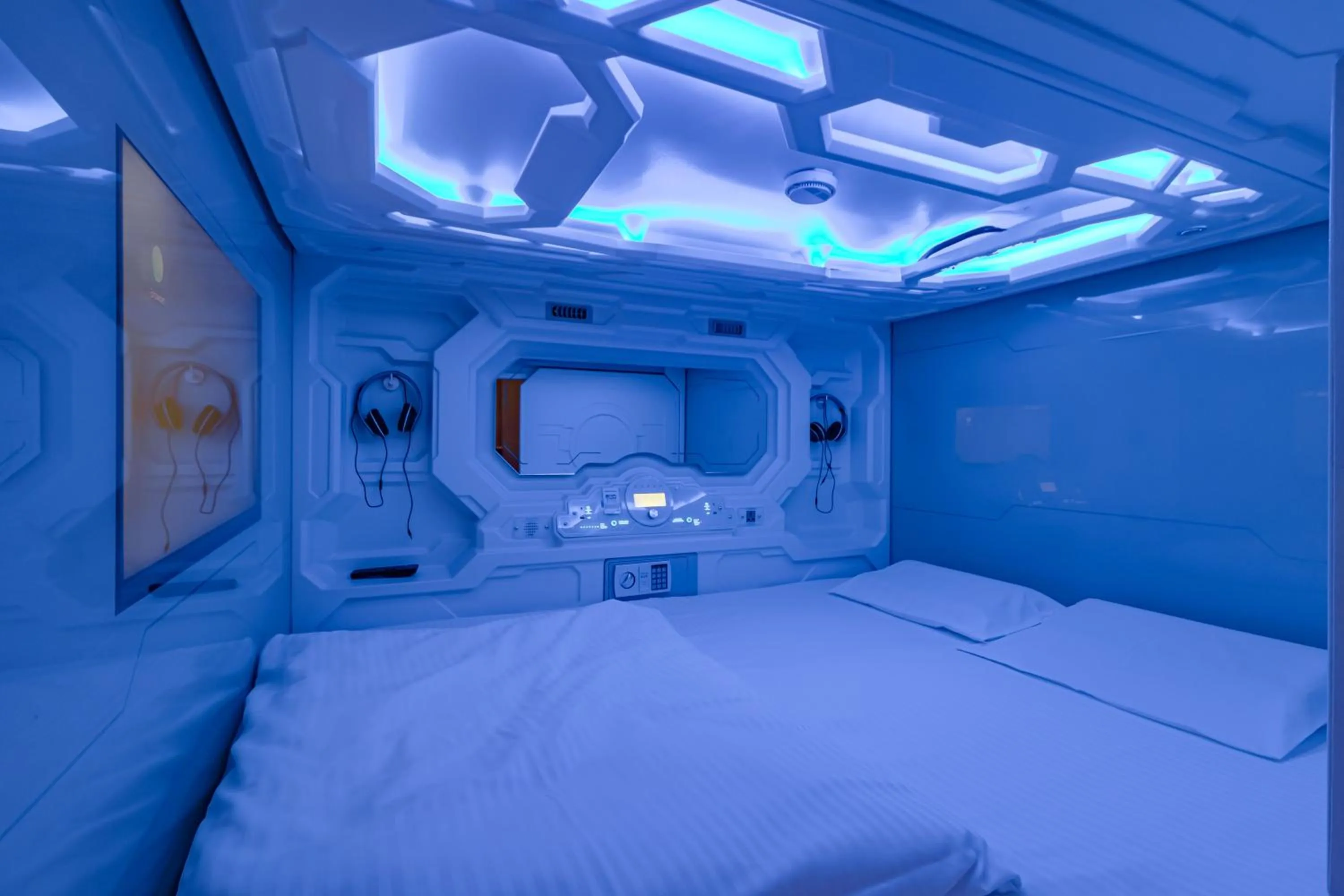 Bed in CAPS LOCK Future Hotel