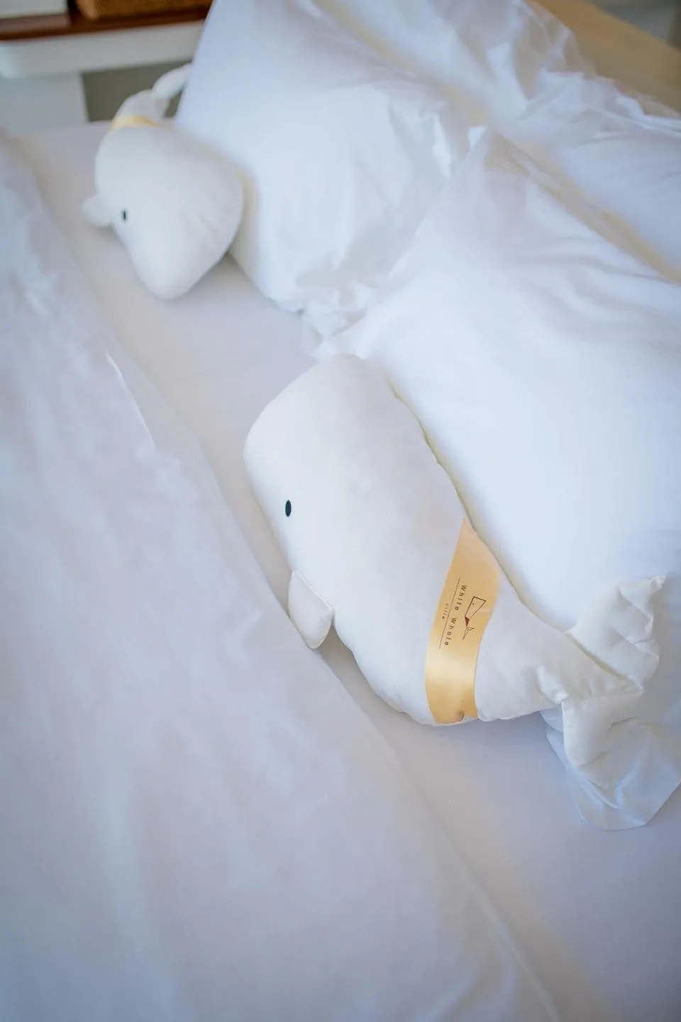 Bed in White Whale Beachfront Pool Villa