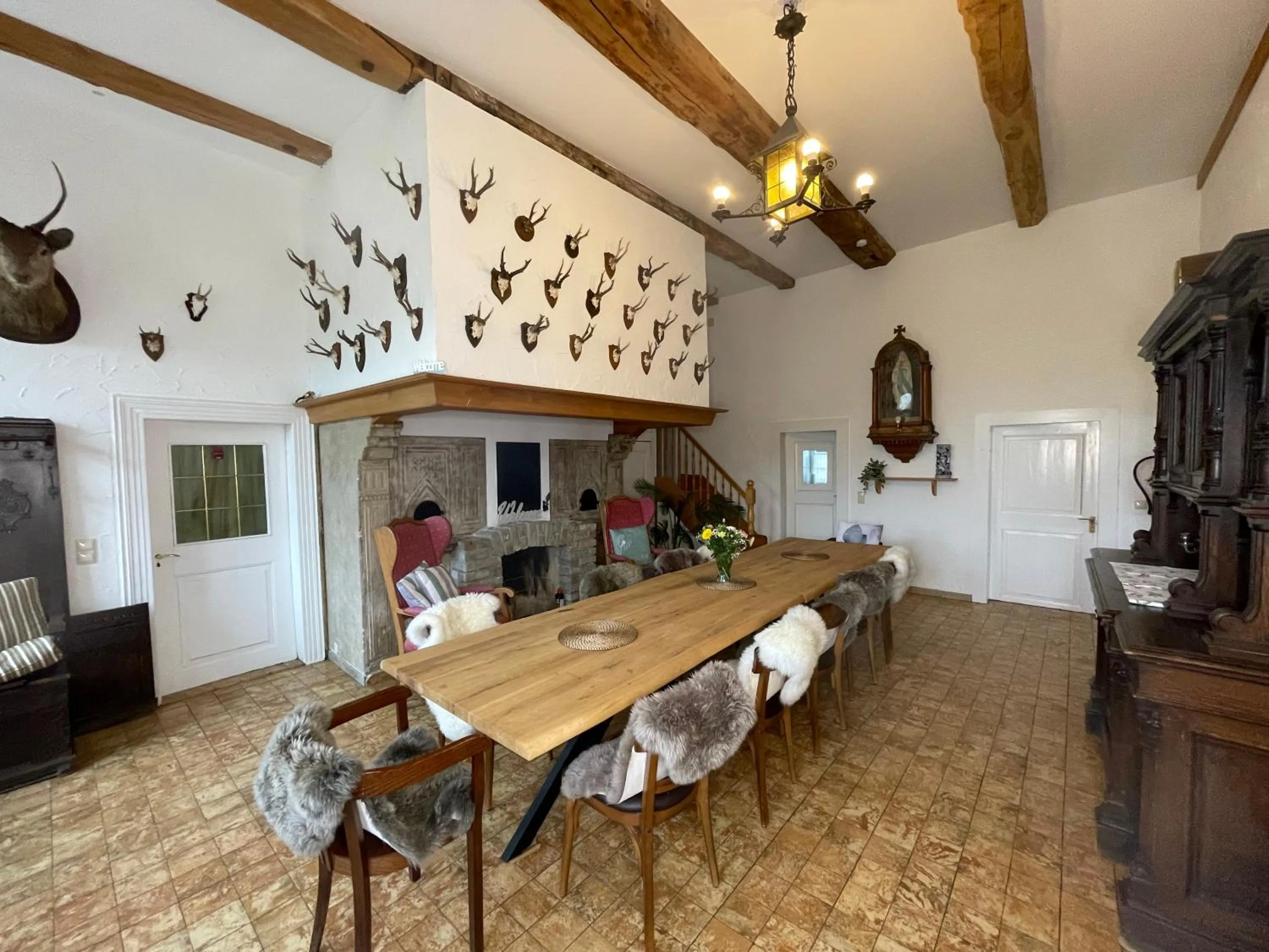 Communal lounge/ TV room in Landhaus Holthausen