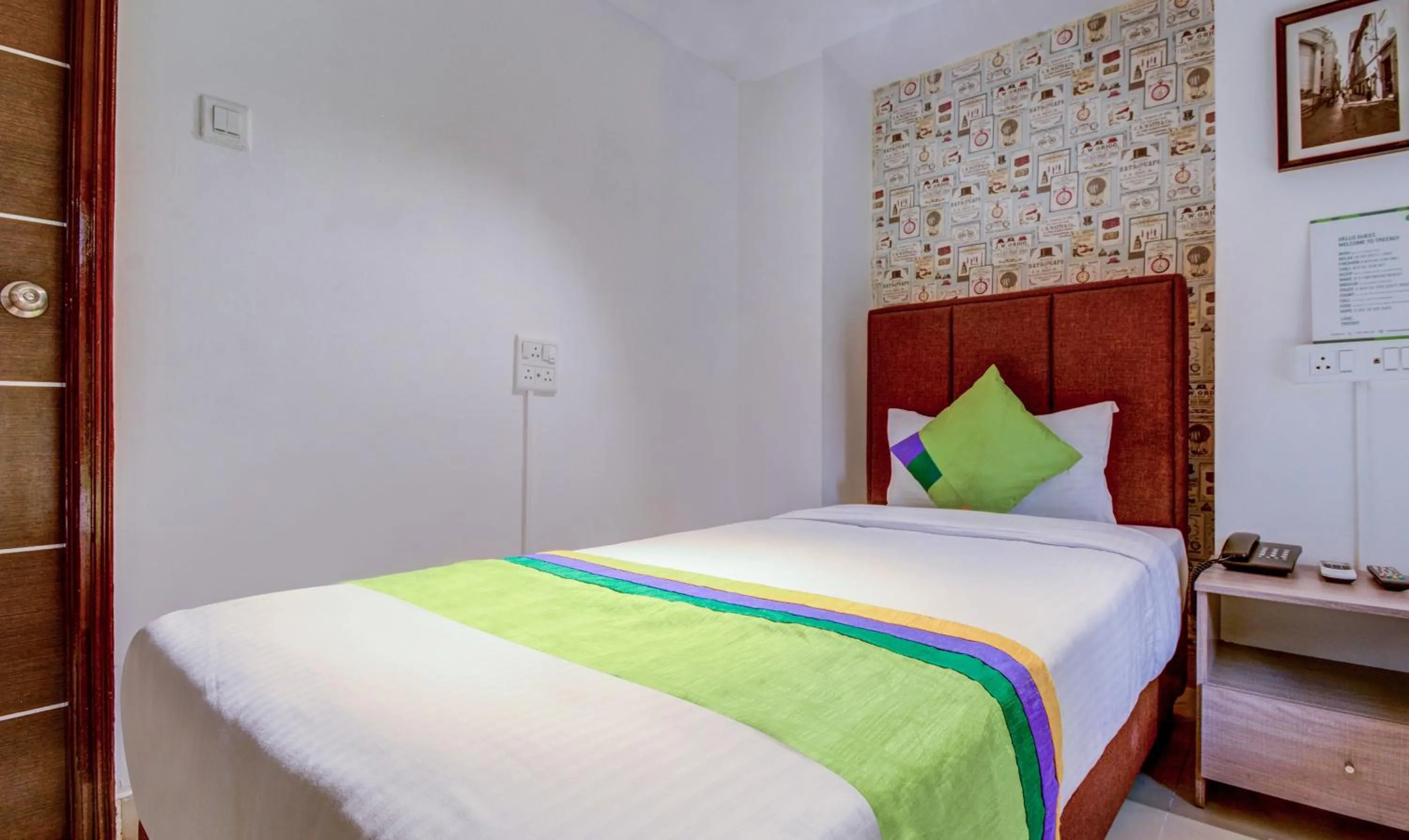 Bedroom, Bed in Treebo Iris Suites