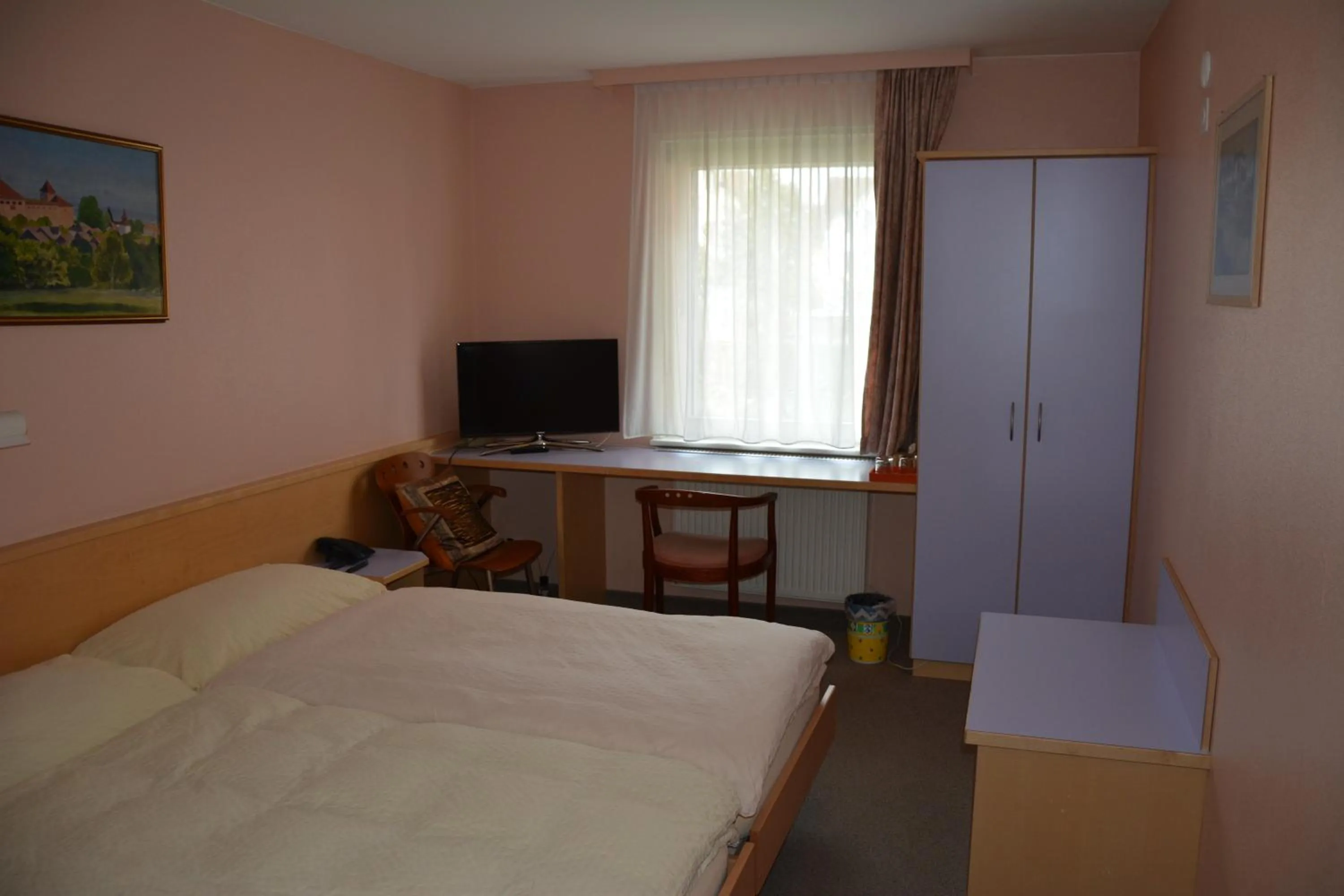 Photo of the whole room, Bed in Hotel Hessengüetli