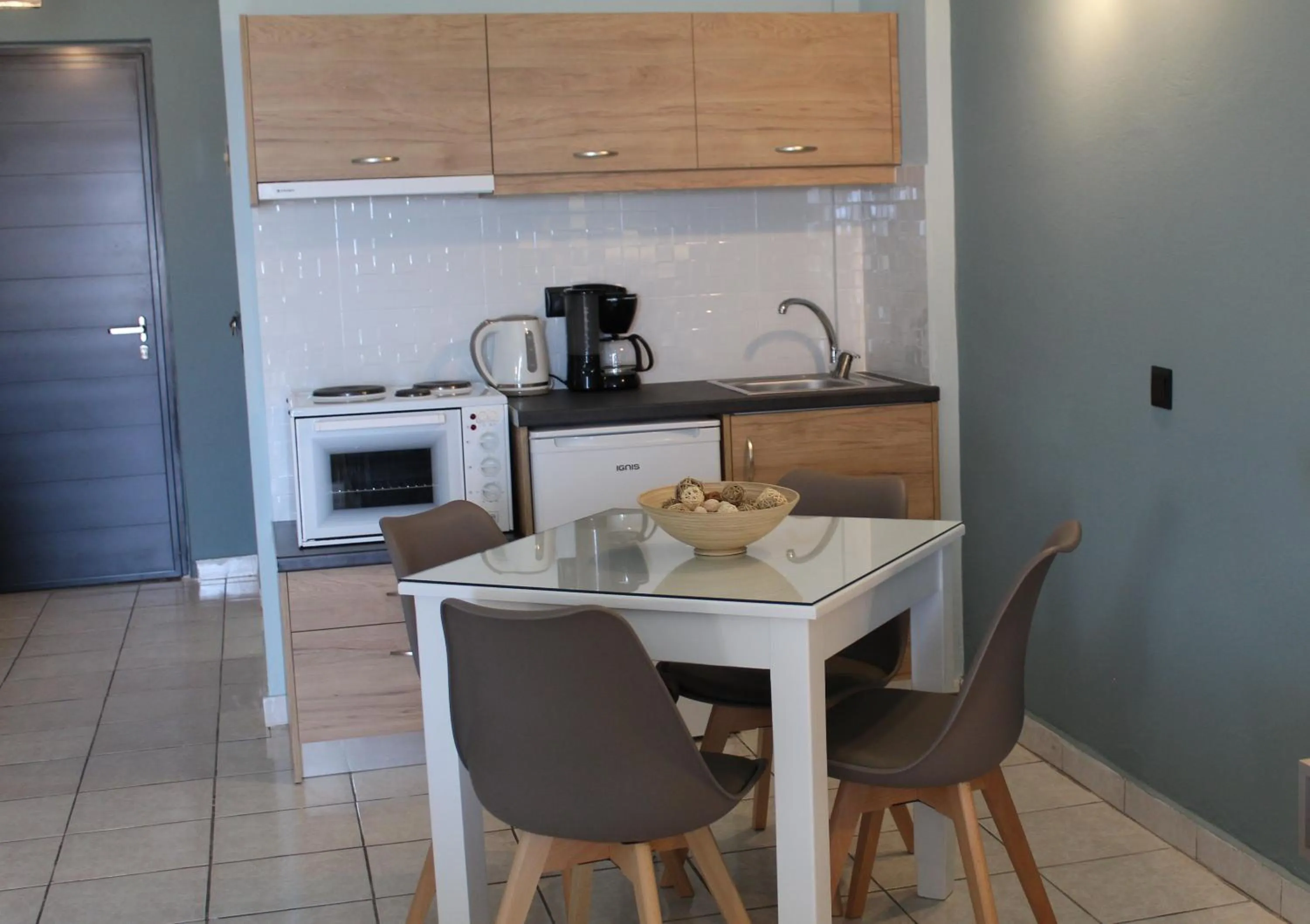 Kitchen or kitchenette in Poledas Apartments