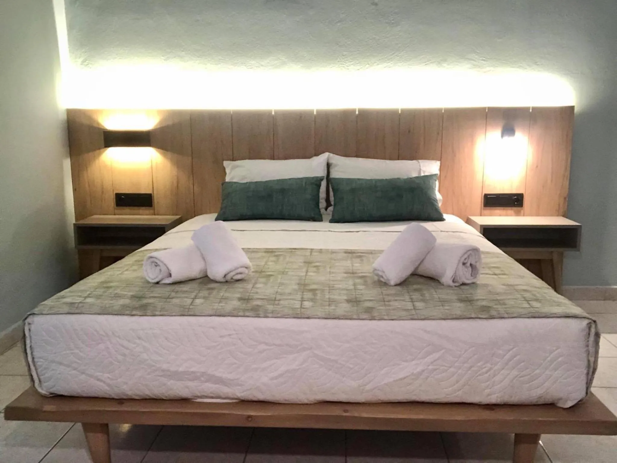 Bed in Poledas Apartments