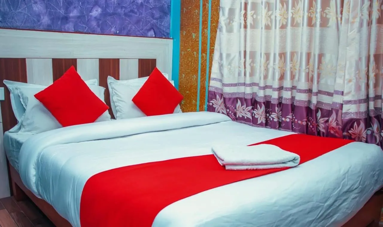 Bed in Hotel Middle Point Pvt Ltd