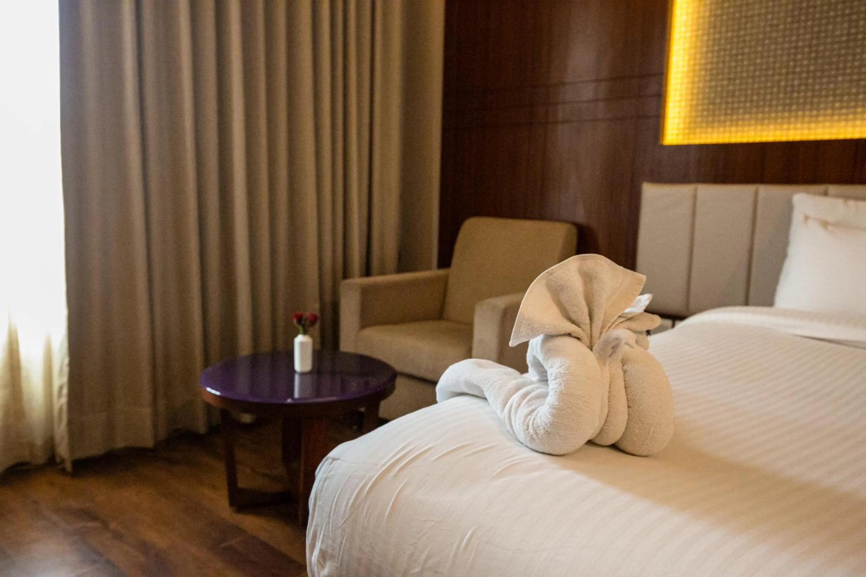 Bed in Pristine Hotel, Varanasi